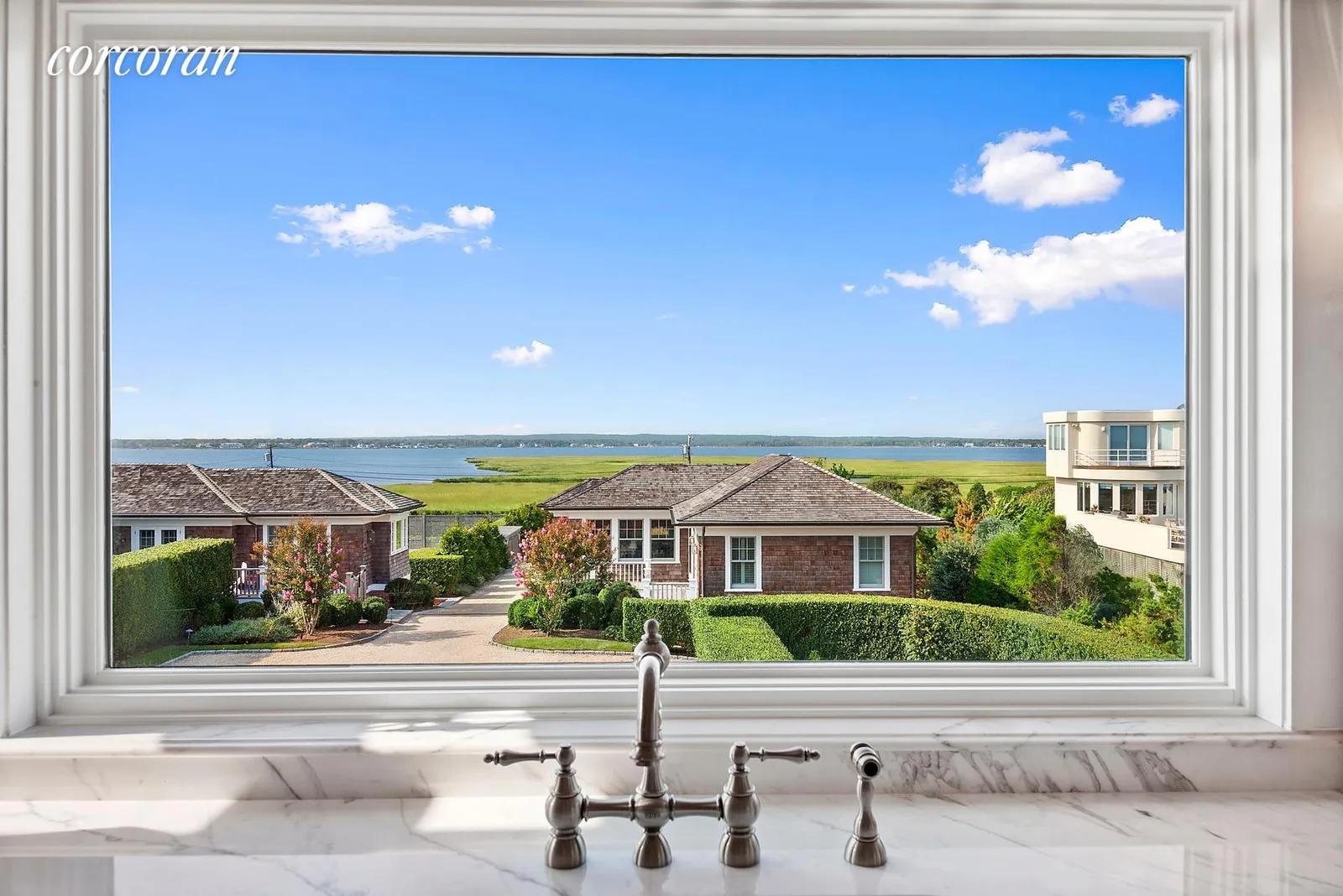New York City Real Estate | View 83 Dune Road | Bay view form Kitchen | View 12