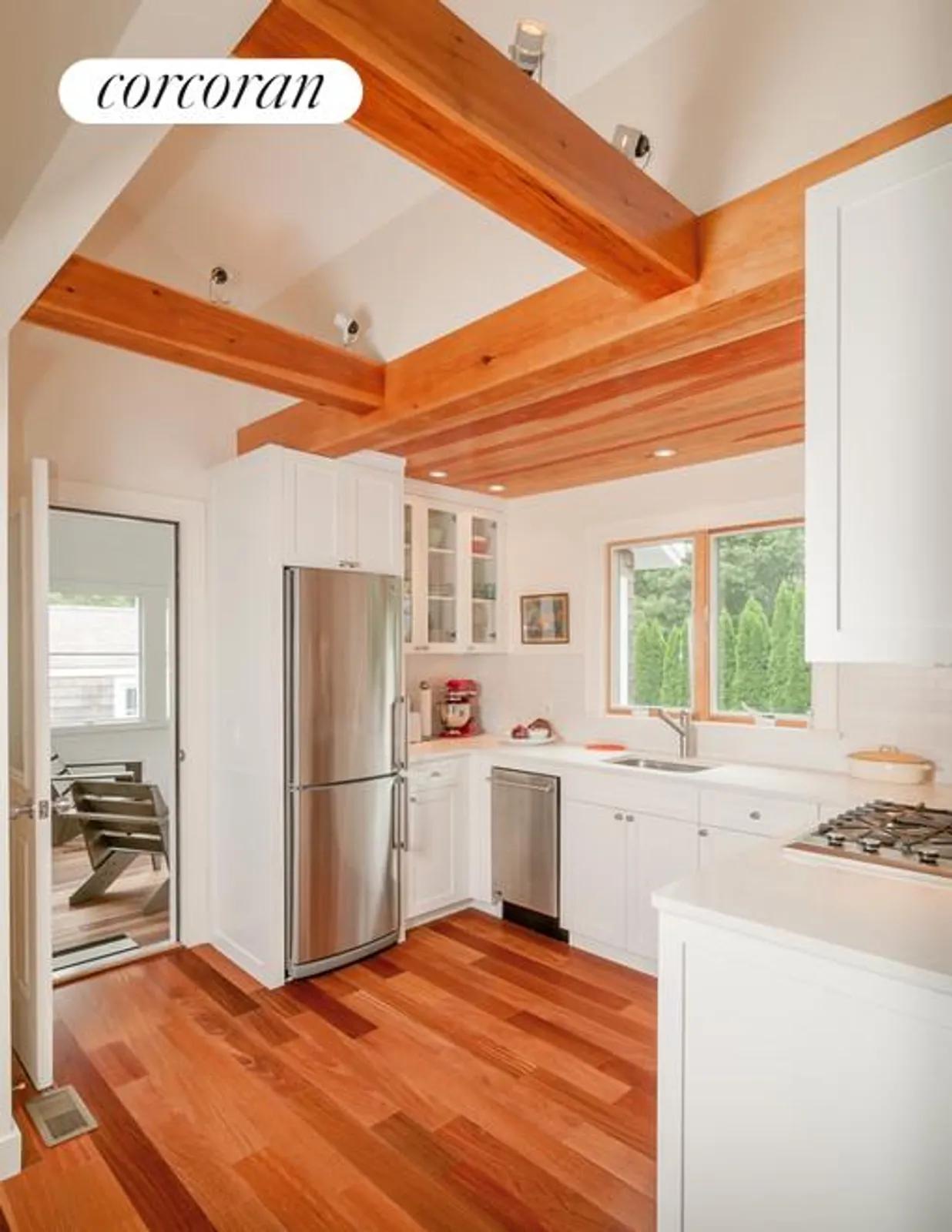 The Hamptons Real Estate | View  | Kitchen and a peek onto the three season porch | View 4