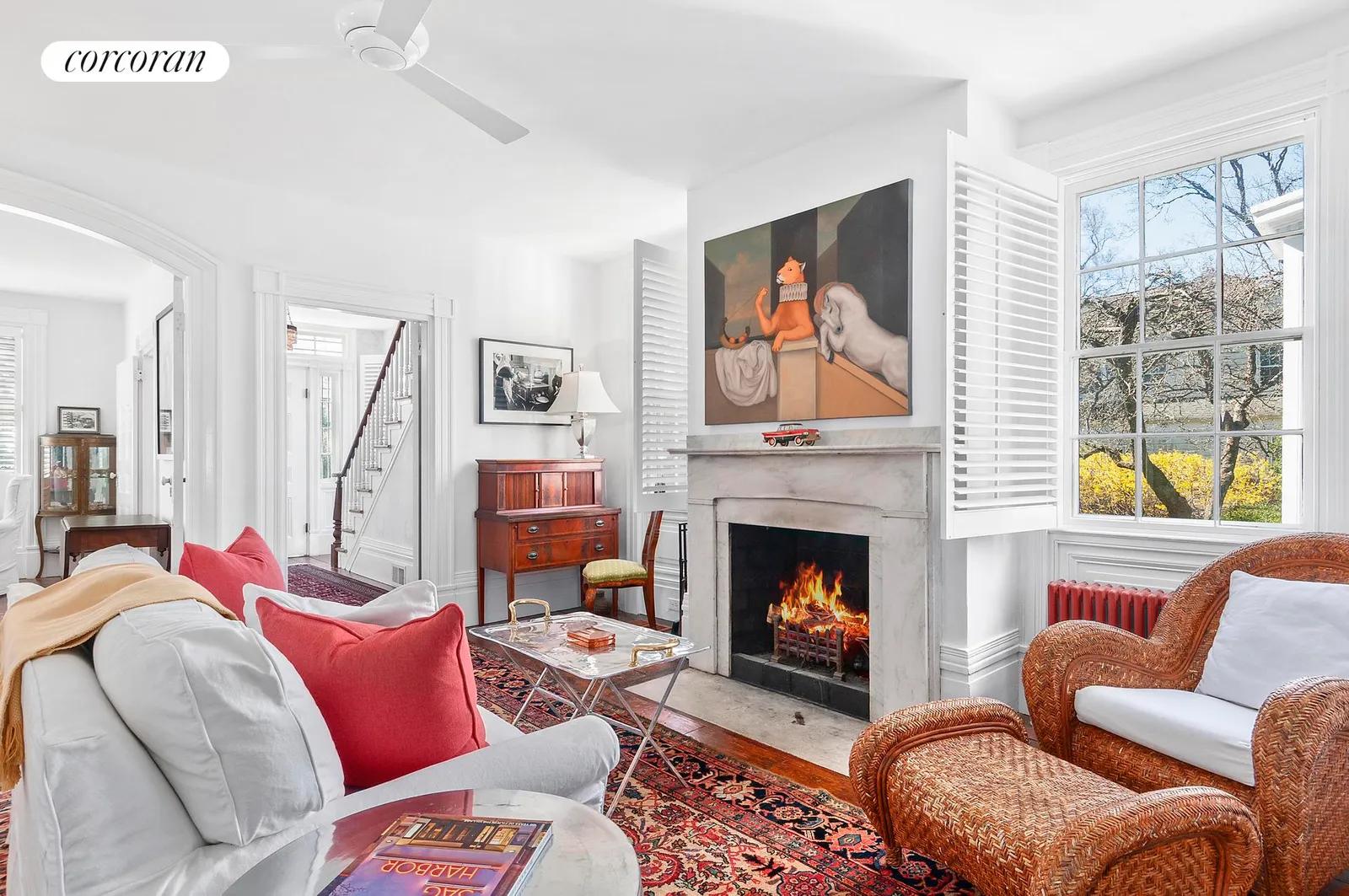 New York City Real Estate | View 286 Main Street | Sunny living room with fireplace | View 6