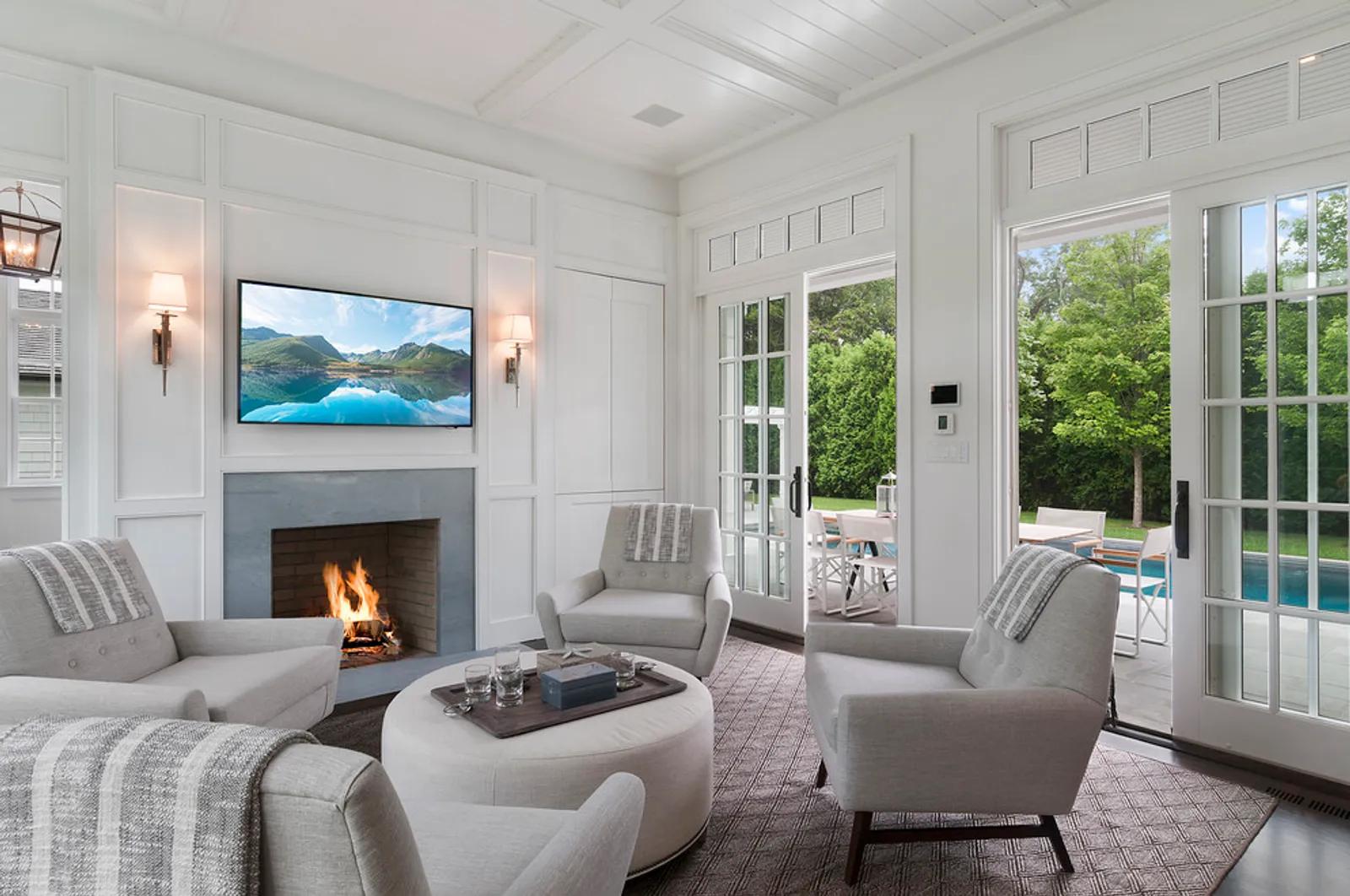 The Hamptons Real Estate | View  | Great Room With Fireplace And Access To Terrace, Pool and Yard | View 2