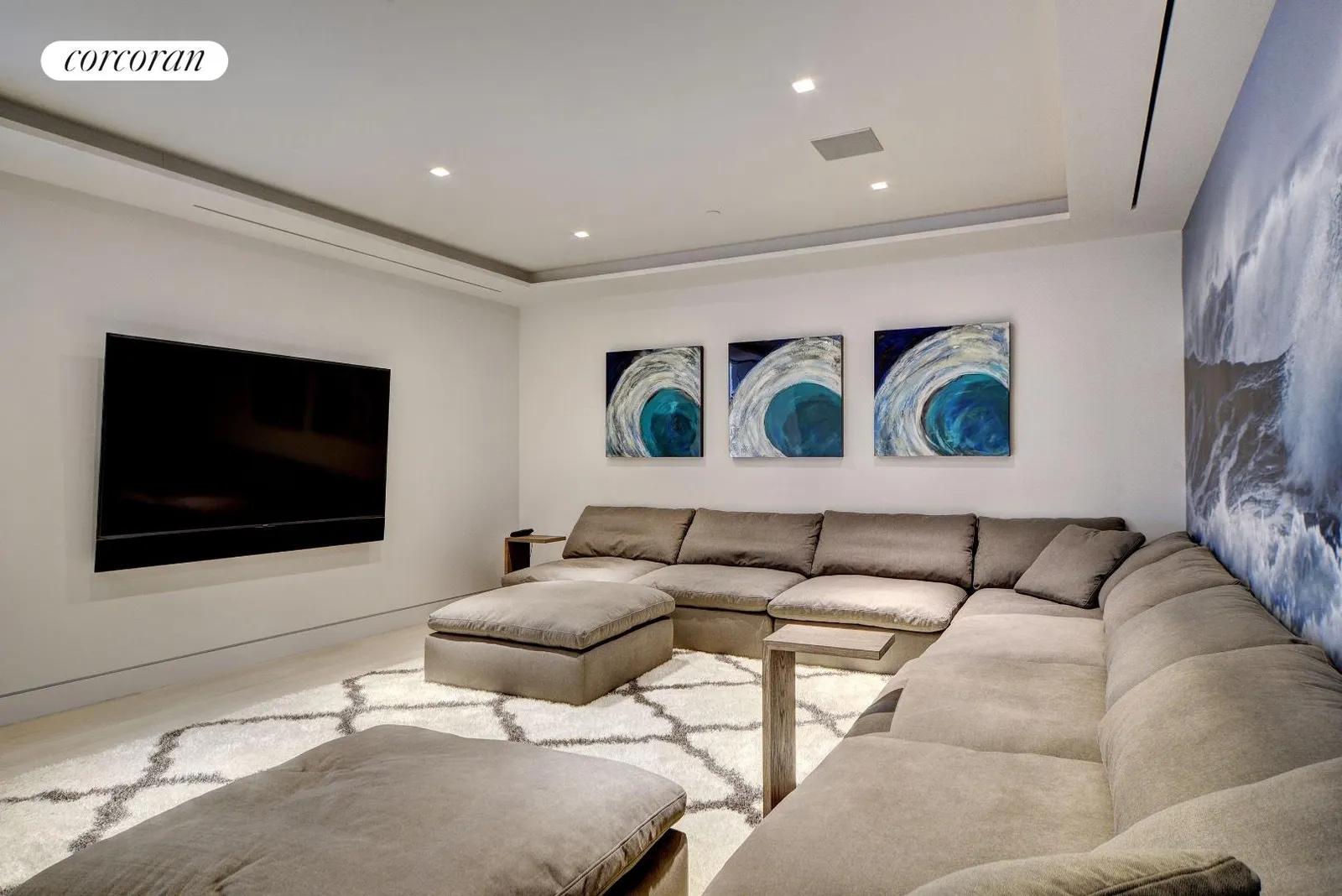New York City Real Estate | View 277 Surfside Drive | 1st floor media room | View 8