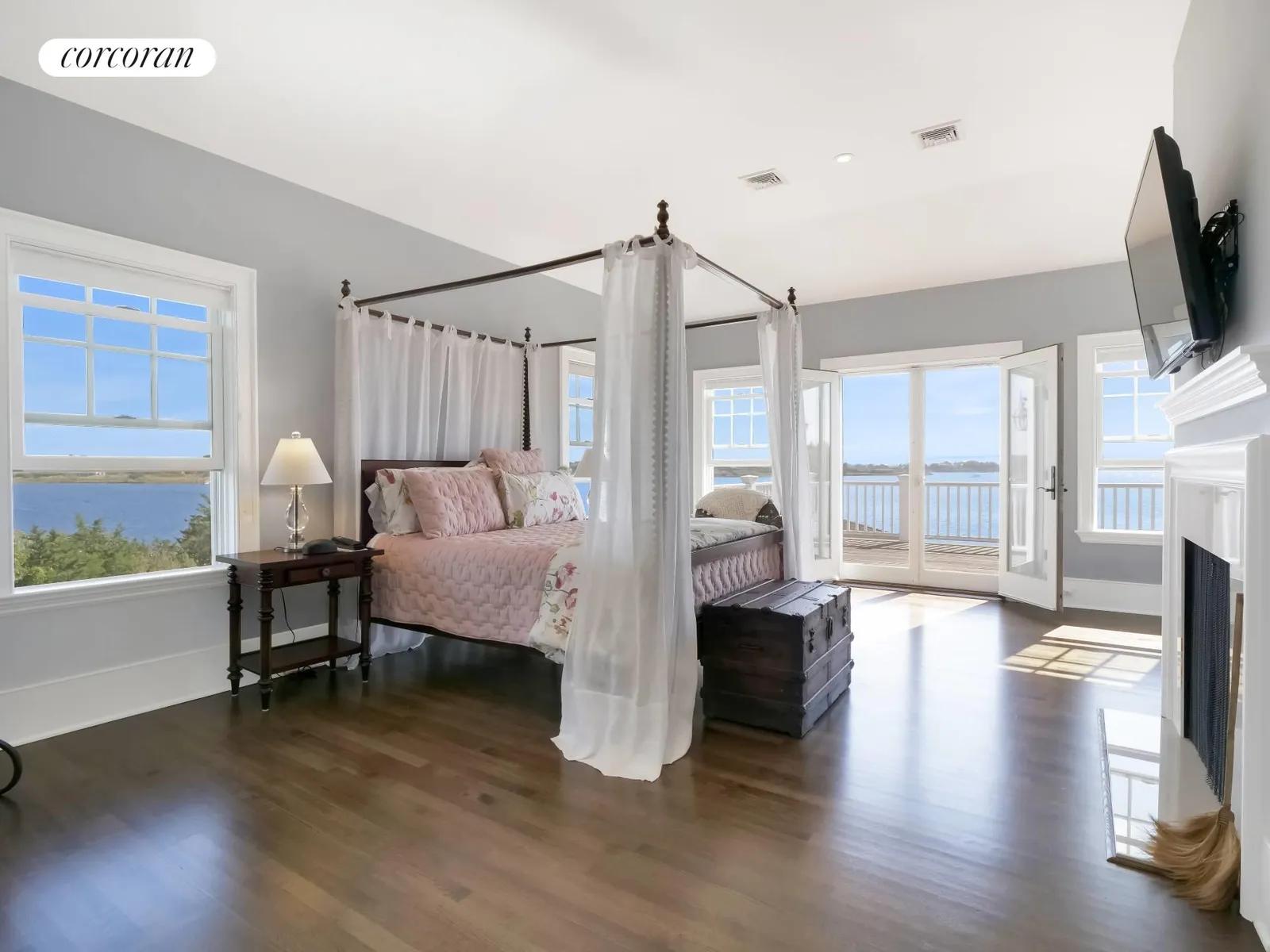 The Hamptons Real Estate | View 541 Main Street | Master Suite with Fireplace | View 21