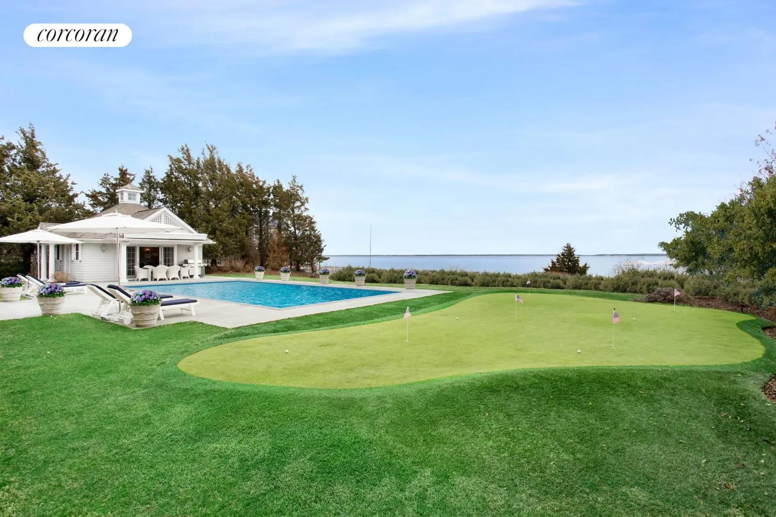 The Hamptons Real Estate | View 2503 Camp Mineola Ext | Putting Green | View 7