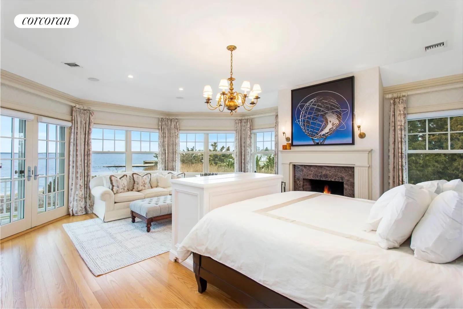 The Hamptons Real Estate | View 2503 Camp Mineola Ext | Primary Bedroom w. FPL | View 11