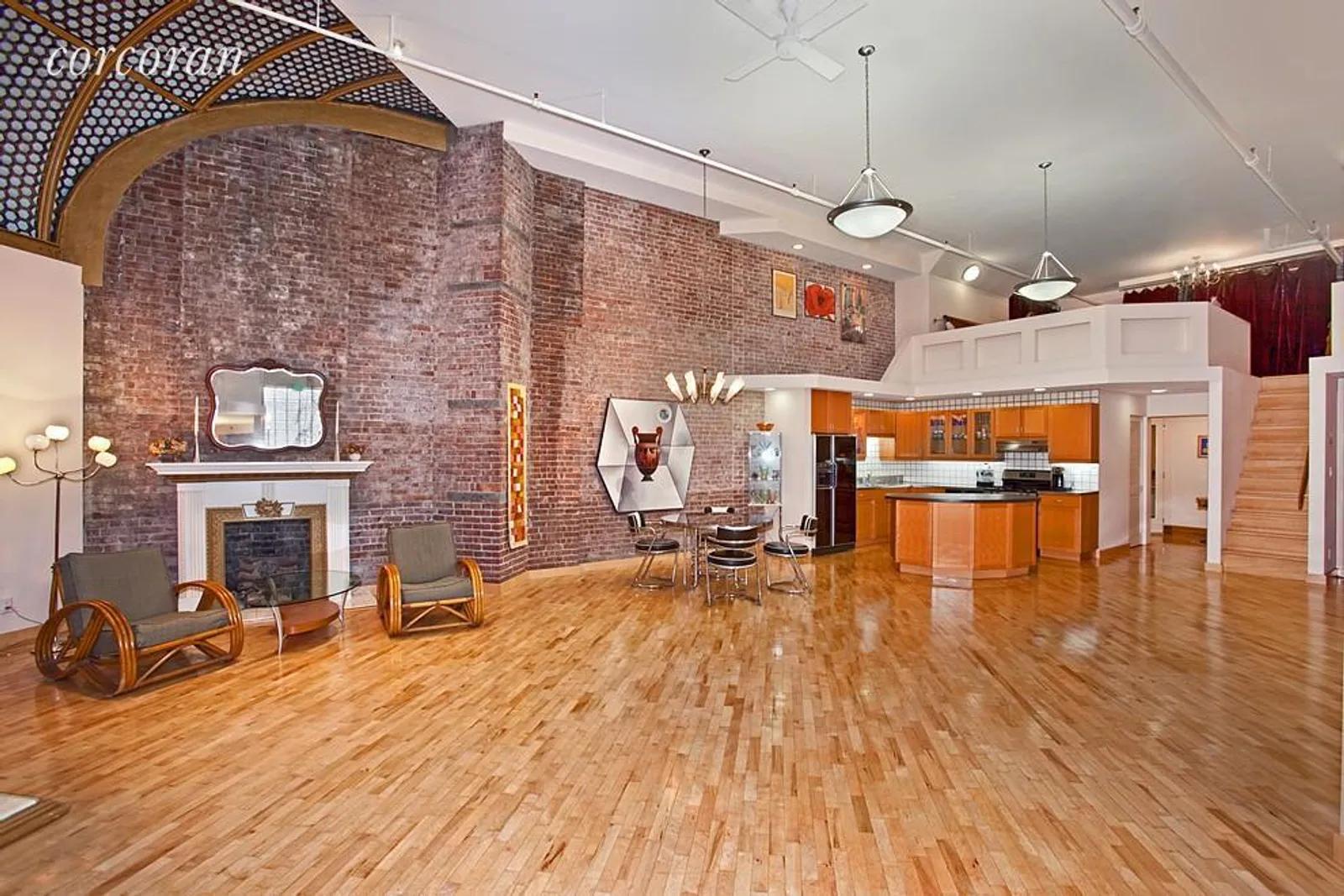 New York City Real Estate | View 428 Broome Street, 1R | Living room and kitchen | View 4