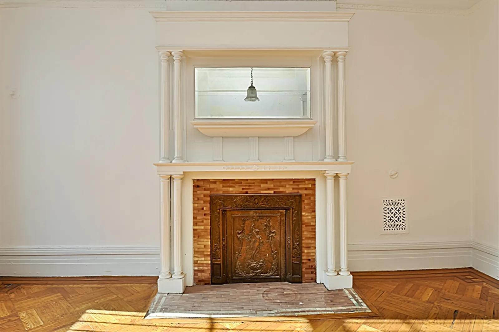 New York City Real Estate | View 390 Sterling Place | 2nd Bedroom with gorgeous decorative mantelpiece | View 4