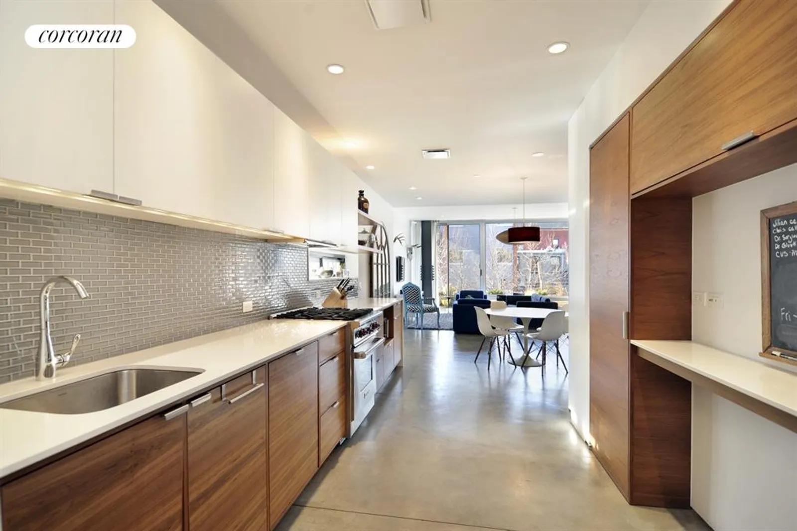 New York City Real Estate | View 114 4th Place, 2 | Custom Teak Cabinetry Provides Tons of Storage | View 2