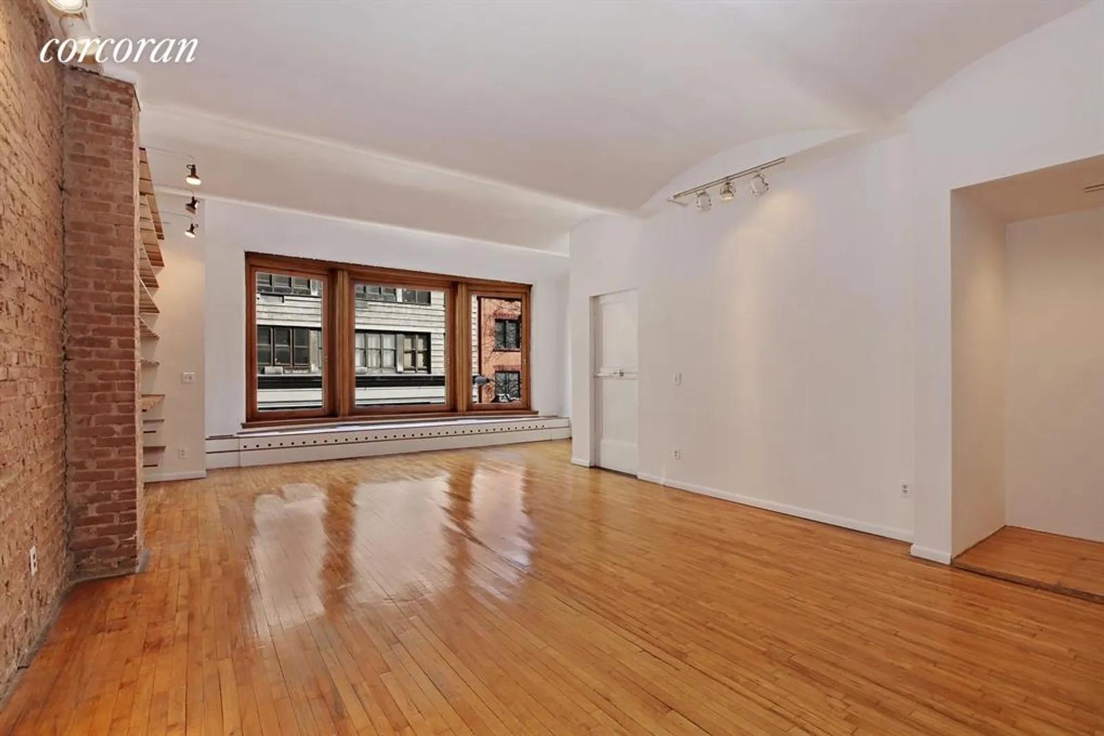 New York City Real Estate | View 34-36 East 10th Street, 3E | Huge Living Room with Barrel Vaulted Ceilings | View 2