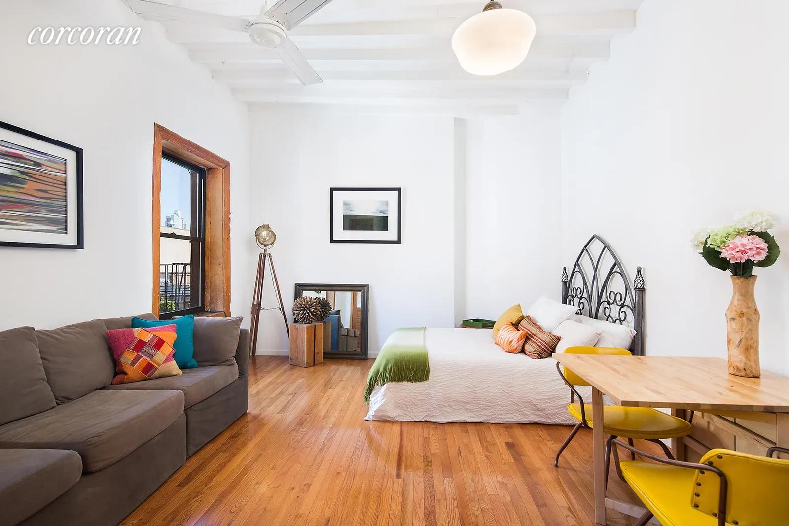 New York City Real Estate | View 237 Eldridge Street, 34 | Sun filled well-proportioned living area | View 2