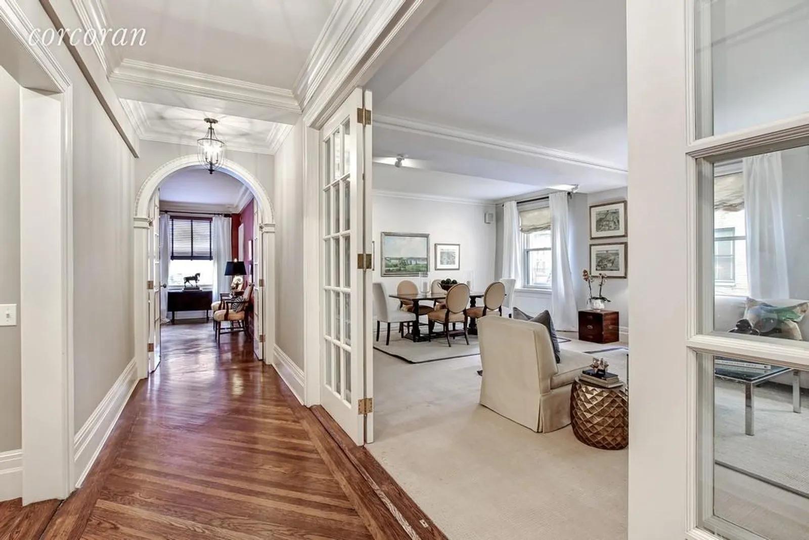 New York City Real Estate | View 150 East 73rd Street, 7D | Gallery With Living/Dining Room and Library/Den | View 3