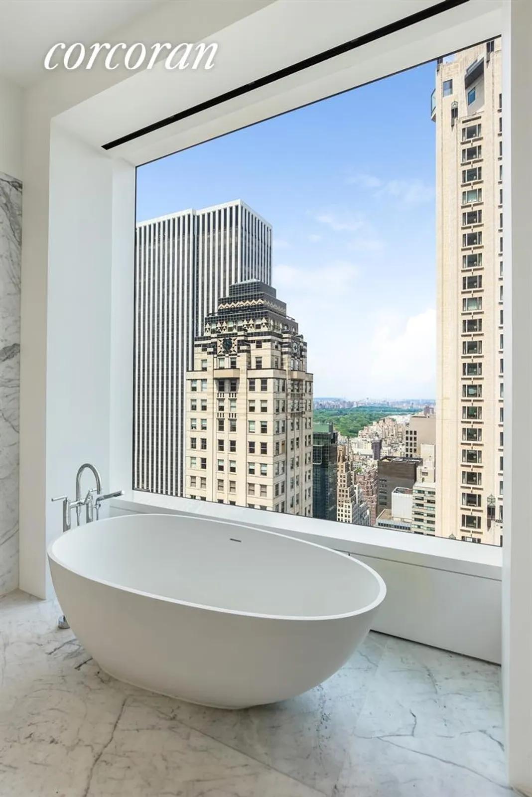 New York City Real Estate | View 432 Park Avenue, 39D | Master Bathroom with Central Park Views | View 8
