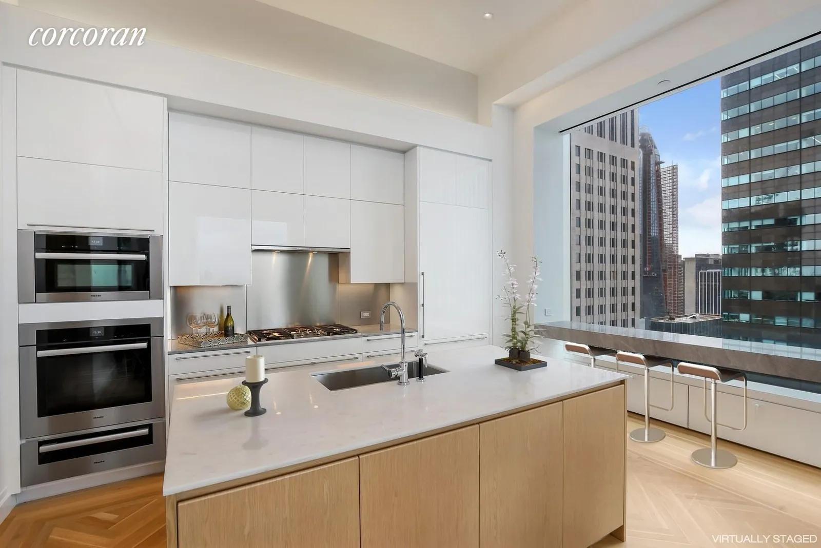 New York City Real Estate | View 432 Park Avenue, 39D | Kitchen with Breakfast Bar | View 4