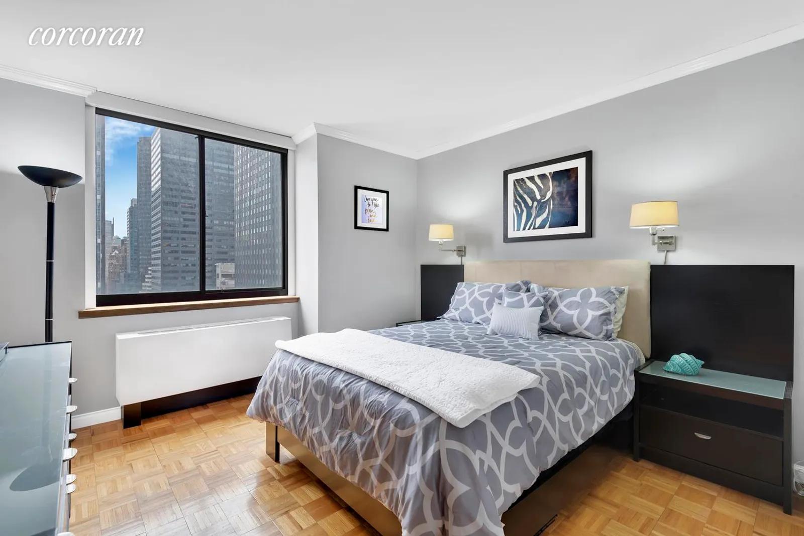 New York City Real Estate | View 250 East 40th Street, 29B | Master bedroom is spacious and sunny | View 3