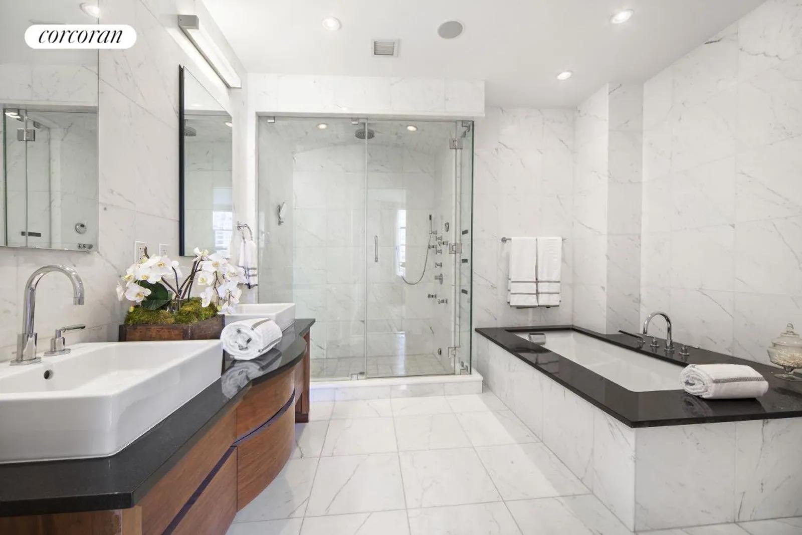 New York City Real Estate | View 173 Macdougal Street, 4E | Marble and granite Master Bathroom | View 9