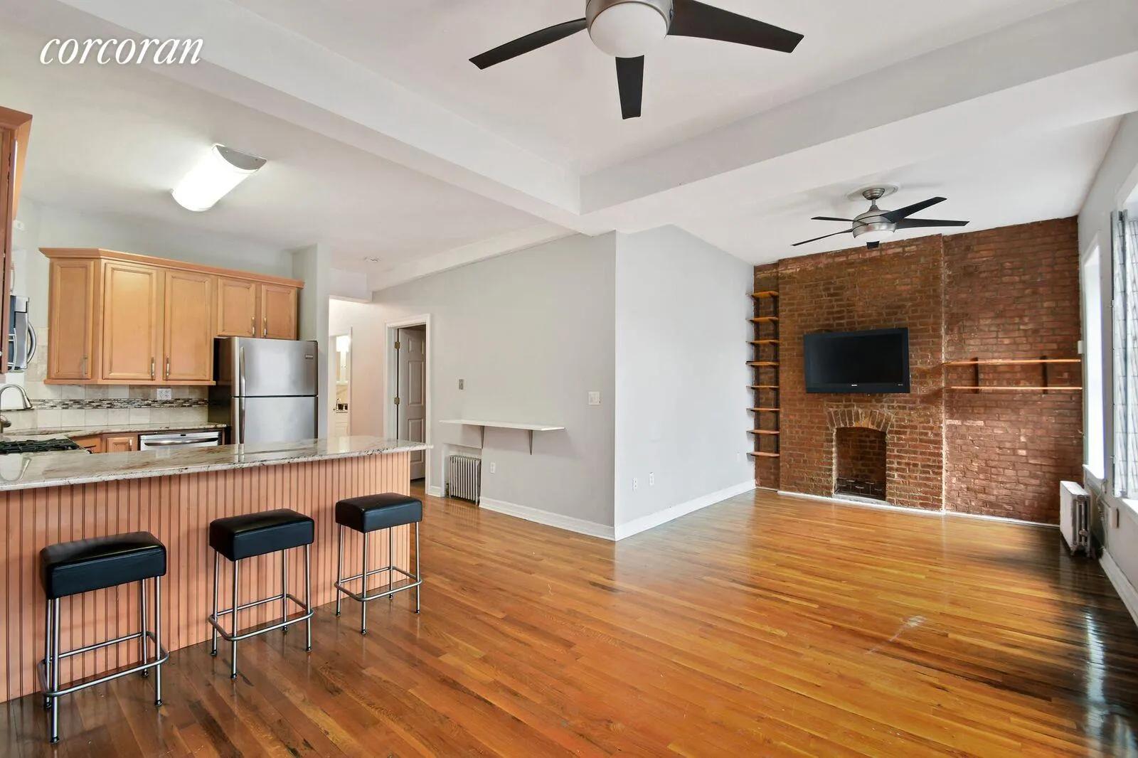 New York City Real Estate | View 7 East 3rd Street, 14 | Living room / Kitchen | View 4