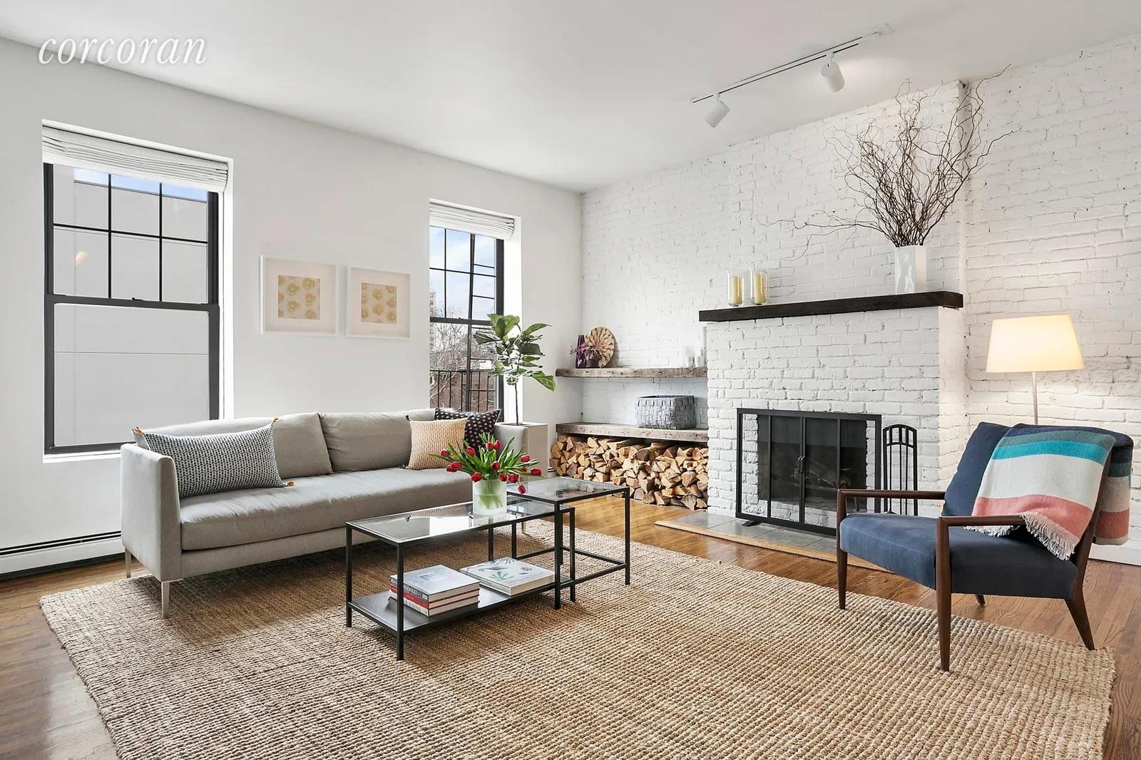 New York City Real Estate | View 167 Bond Street, 3 | Living Room with Exposed Brick Detail | View 3
