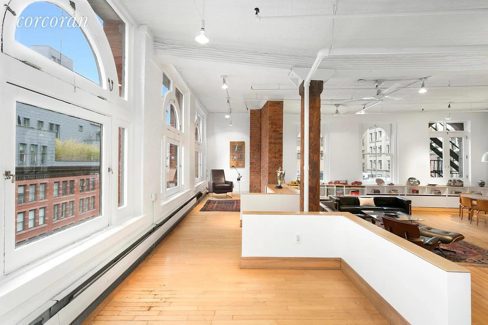New York City Real Estate | View 292 Lafayette Street, 7E | Row of Eastern Facing arched windows | View 5