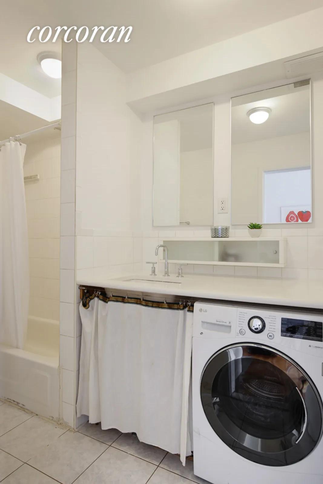 New York City Real Estate | View 27 Essex Street, 5B | Bathroom with W/D in Unit | View 4