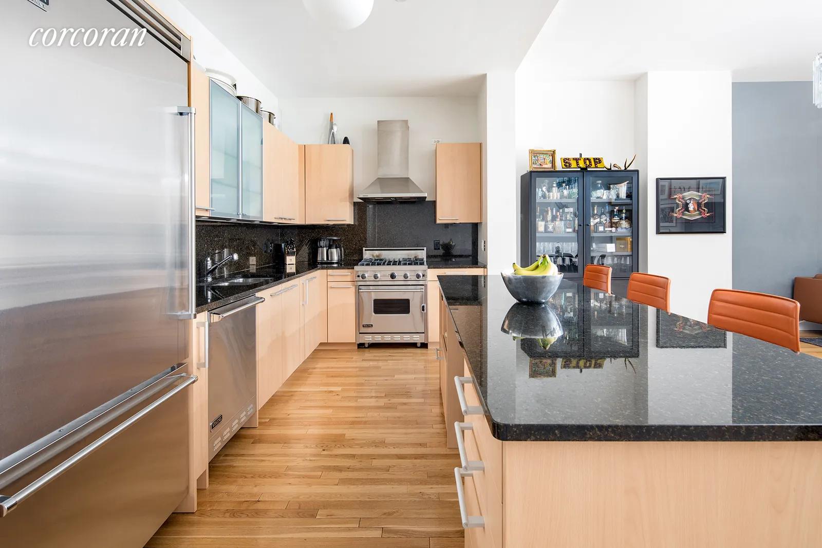New York City Real Estate | View 121 West 19th Street, 7B | Open kitchen with professional-grade appliances | View 3