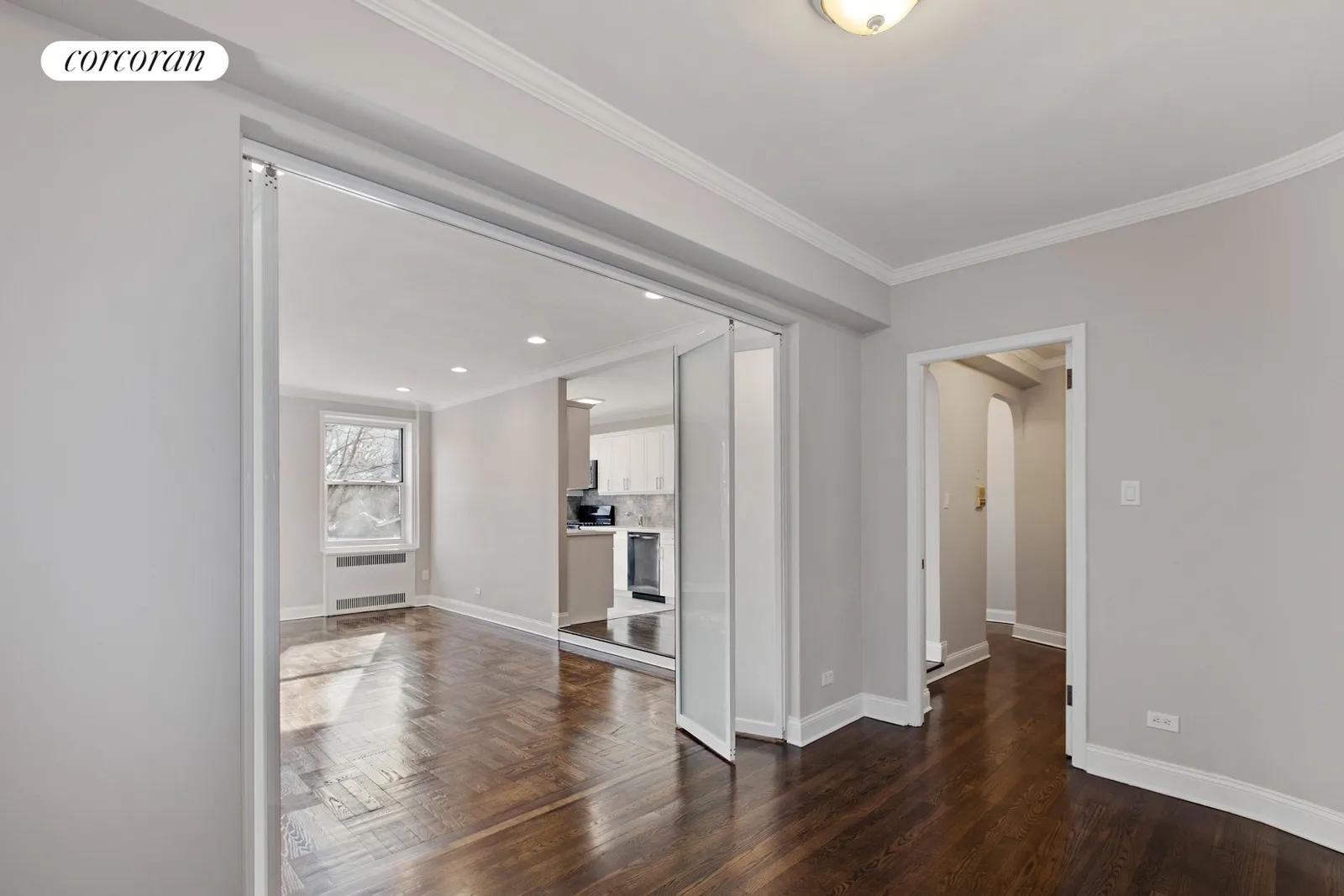 New York City Real Estate | View 1825 Foster Avenue, 2a | Folding doors separate the Flex Room | View 7