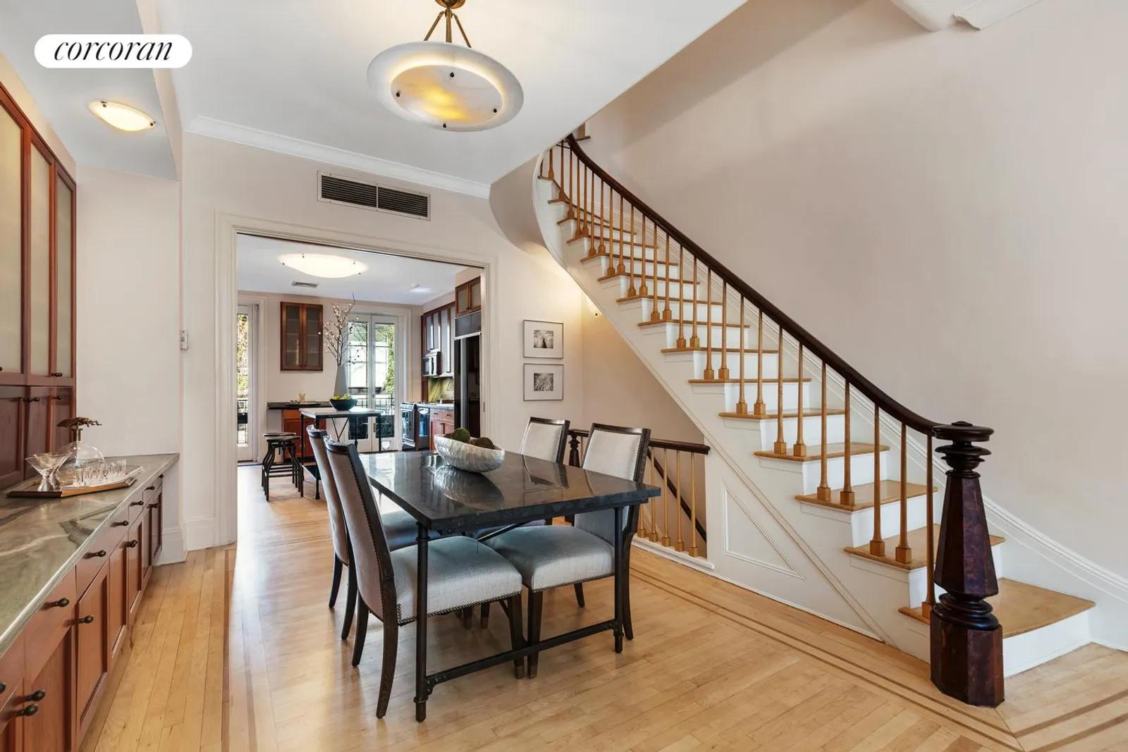 New York City Real Estate | View 483 West 22nd Street | The dining room and stairway leading to the 2nd fl | View 5
