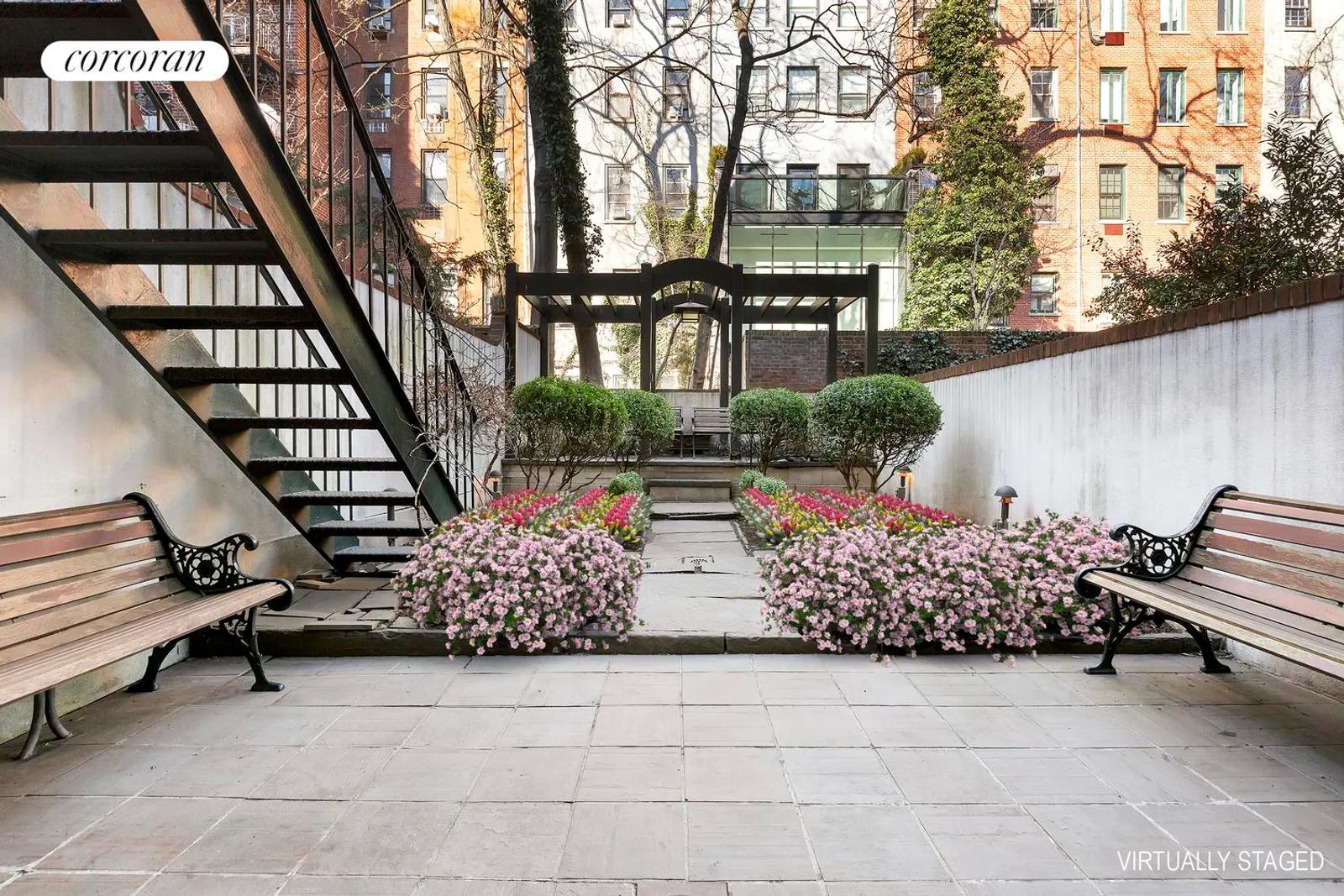 New York City Real Estate | View 483 West 22nd Street | Private sculptured Garden with pergola | View 15