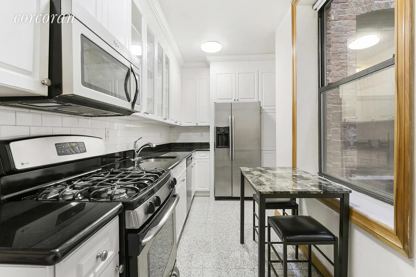 New York City Real Estate | View 100 West 119th Street, 4B | Huge Windowed Kitchen | View 4