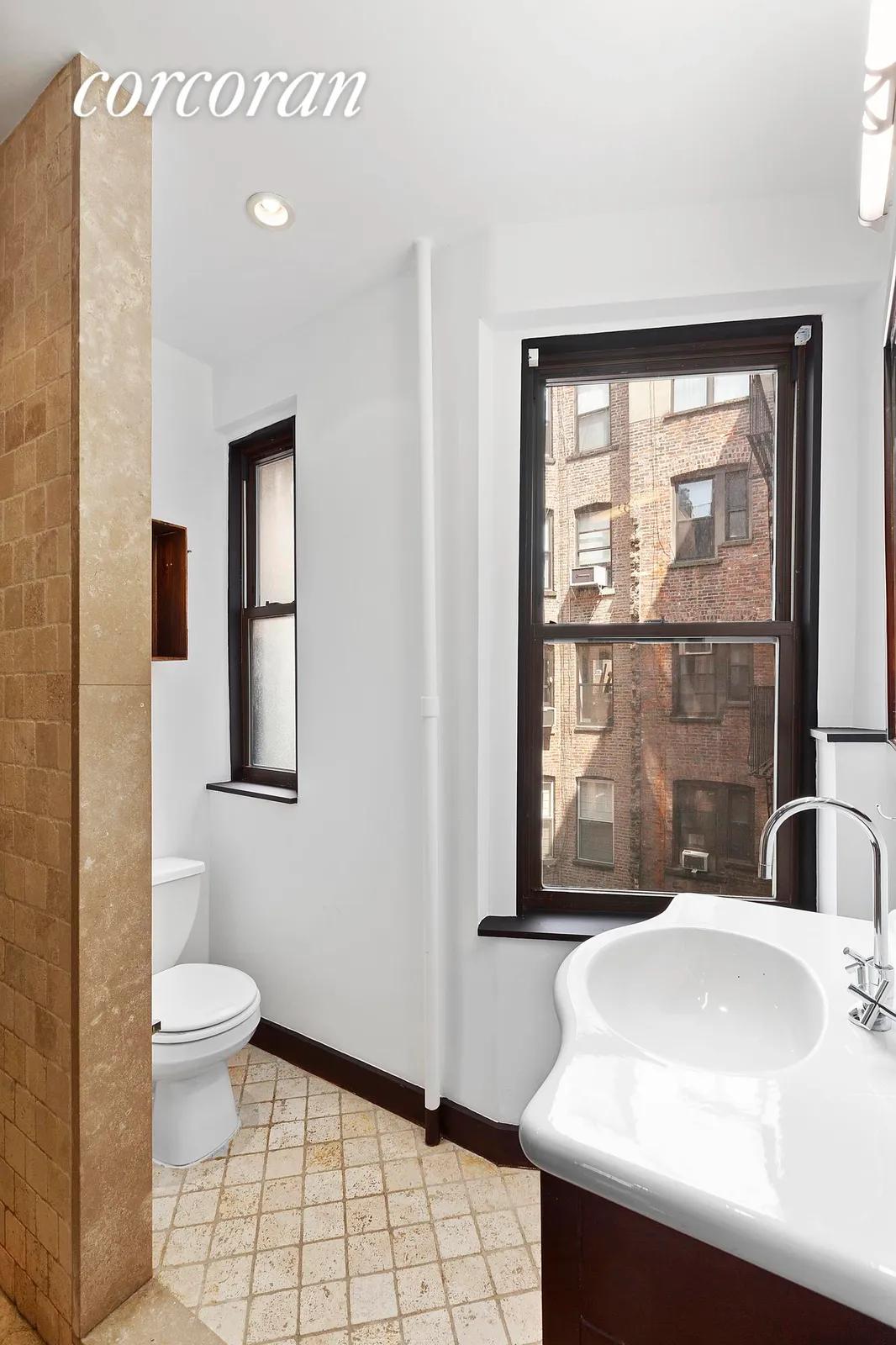 New York City Real Estate | View 237 Eldridge Street, 21 | Windowed Bathroom  | View 4