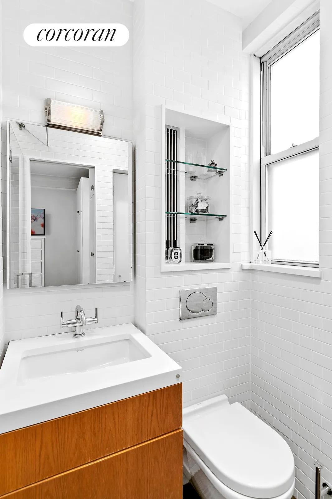 New York City Real Estate | View 780 West End Avenue, 2A | floating vanity and crisp white tiled walls | View 10