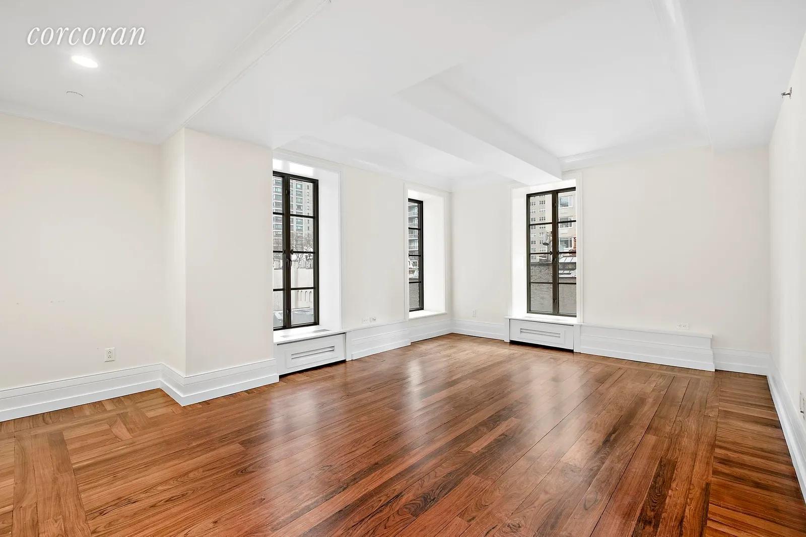 New York City Real Estate | View 140 East 63rd Street, 6D | Double Exposures and Bolivian Rosewood Floors | View 8