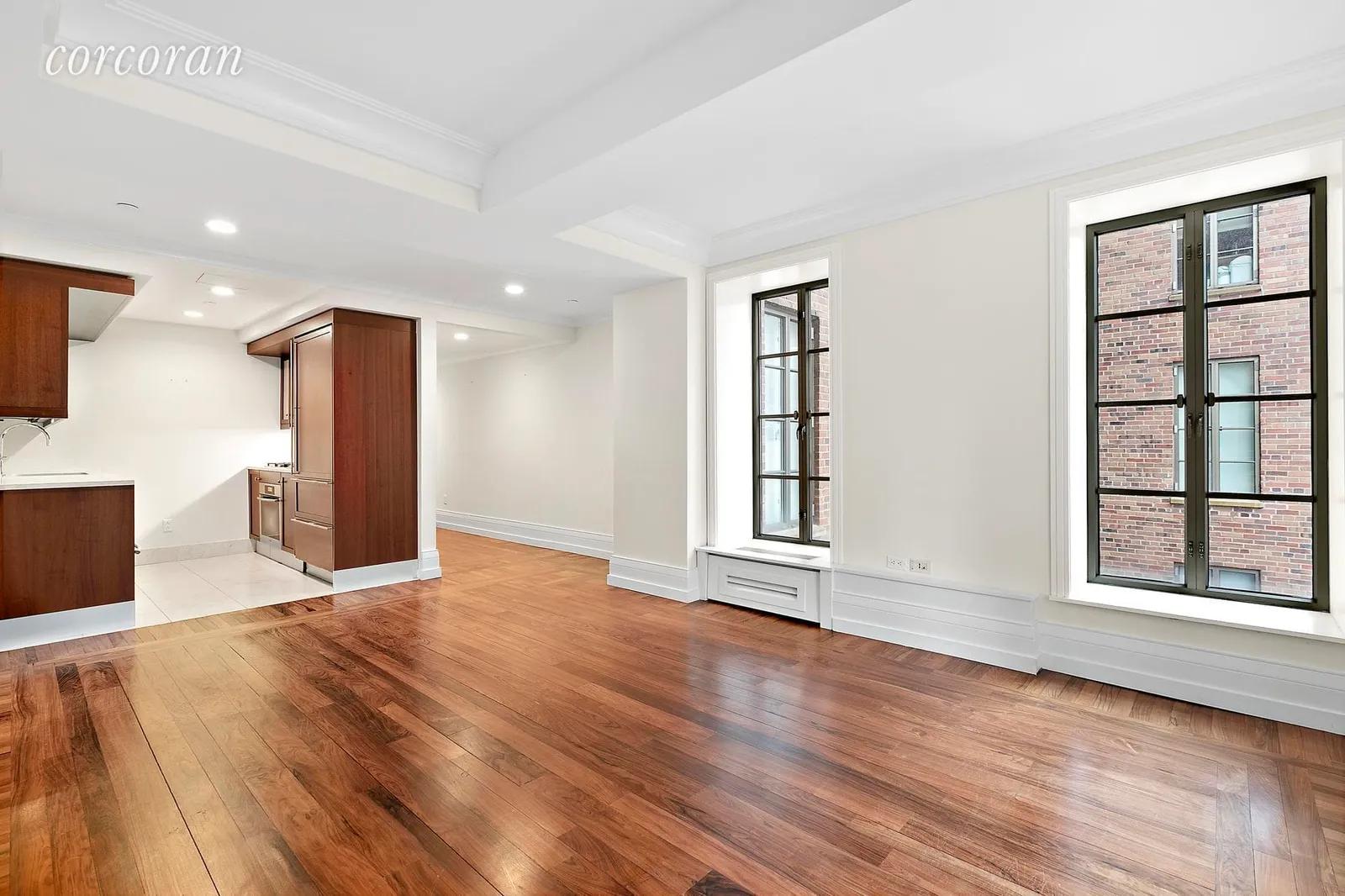 New York City Real Estate | View 140 East 63rd Street, 6D | Living Room French Casement Windows | View 9