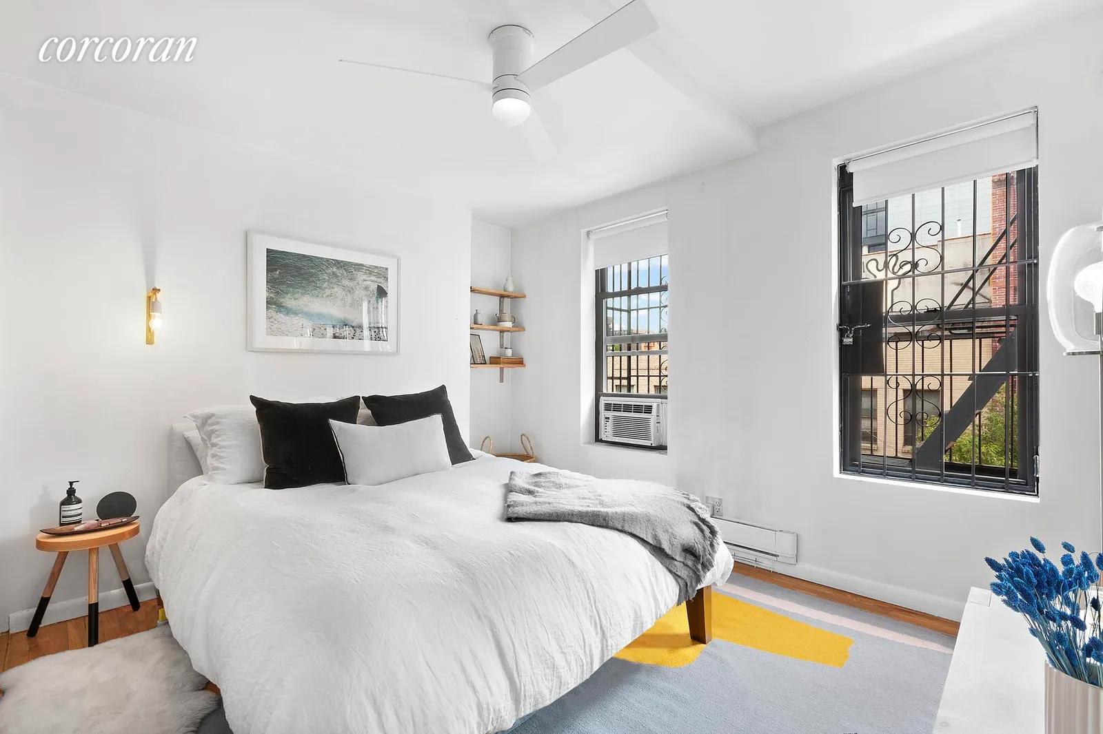 New York City Real Estate | View 85 Stanton Street, 4A | Bedroom with a Full Wall of Custom Closets | View 2