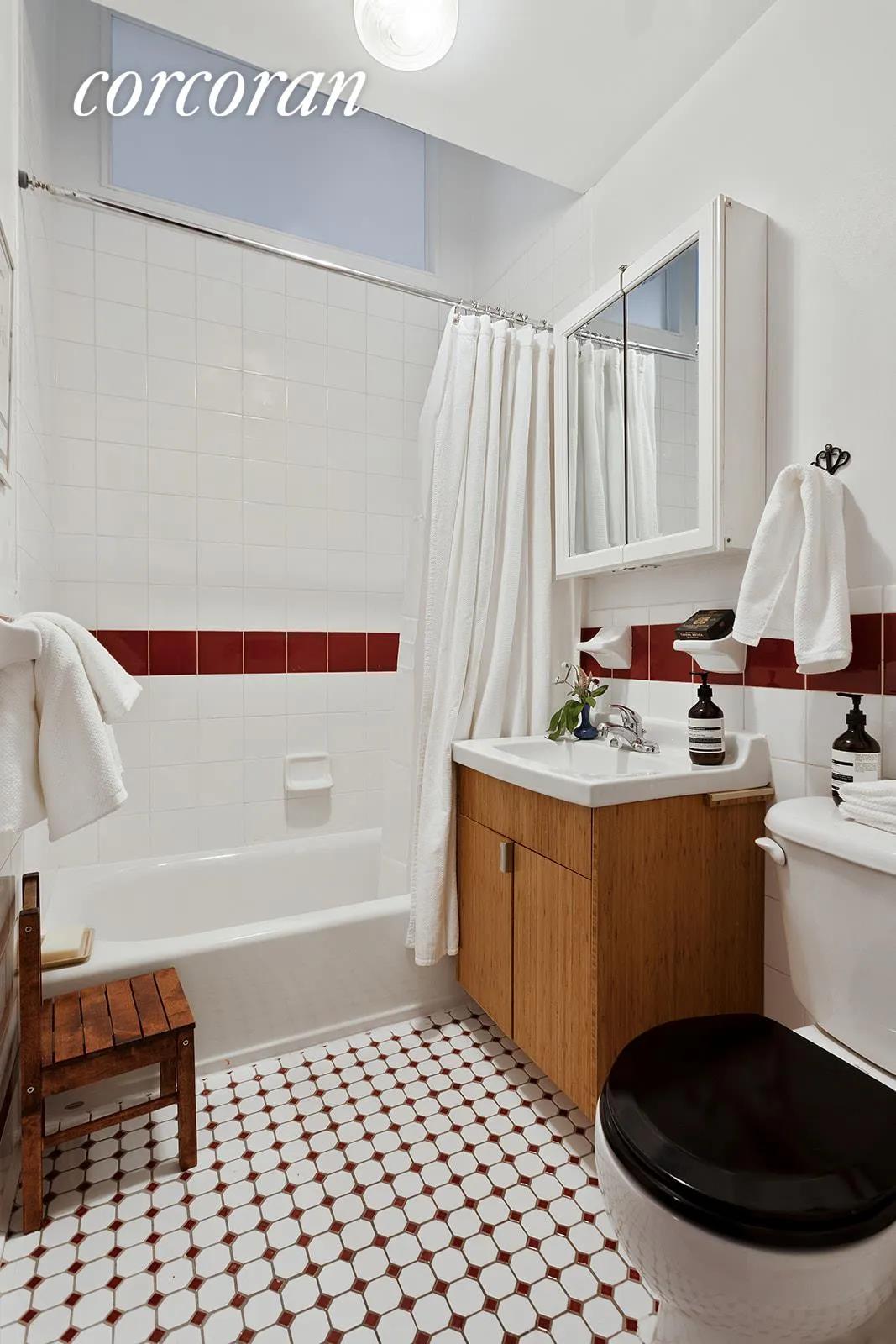 New York City Real Estate | View 259 21st Street, 2G | Tiled bathroom, and includes in-unit washer/dryer | View 7
