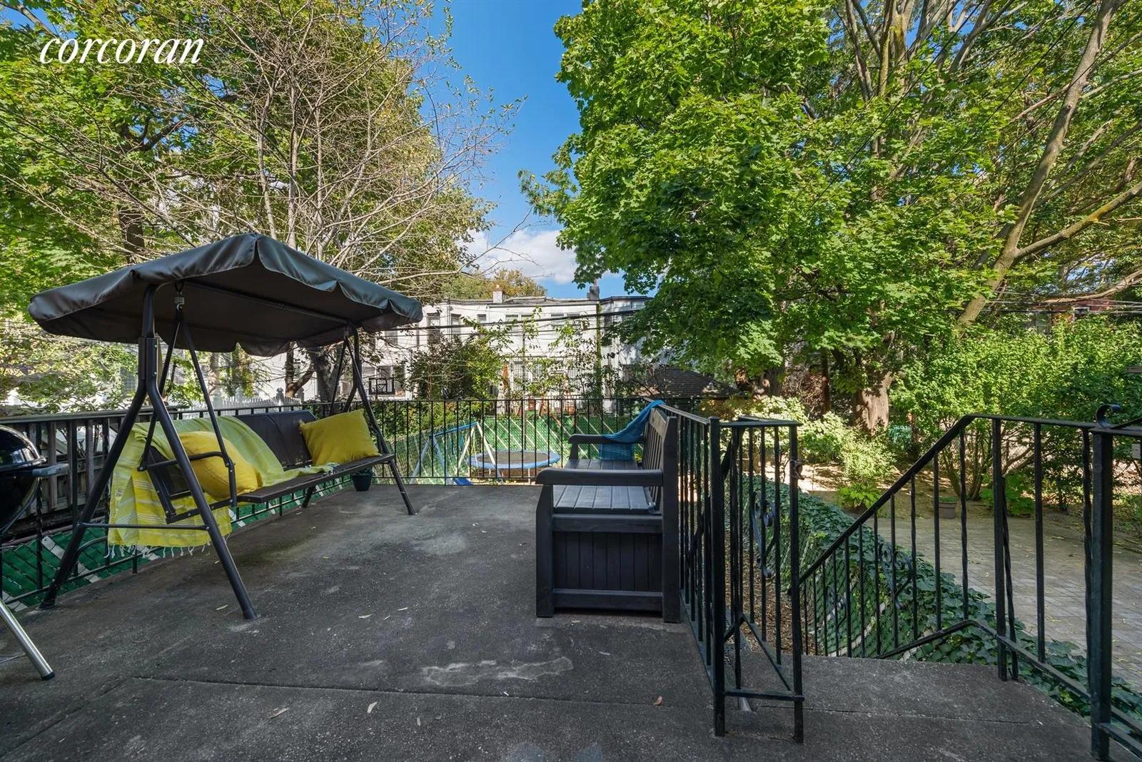 New York City Real Estate | View 441 76th Street | Large deck overlooking garden | View 9