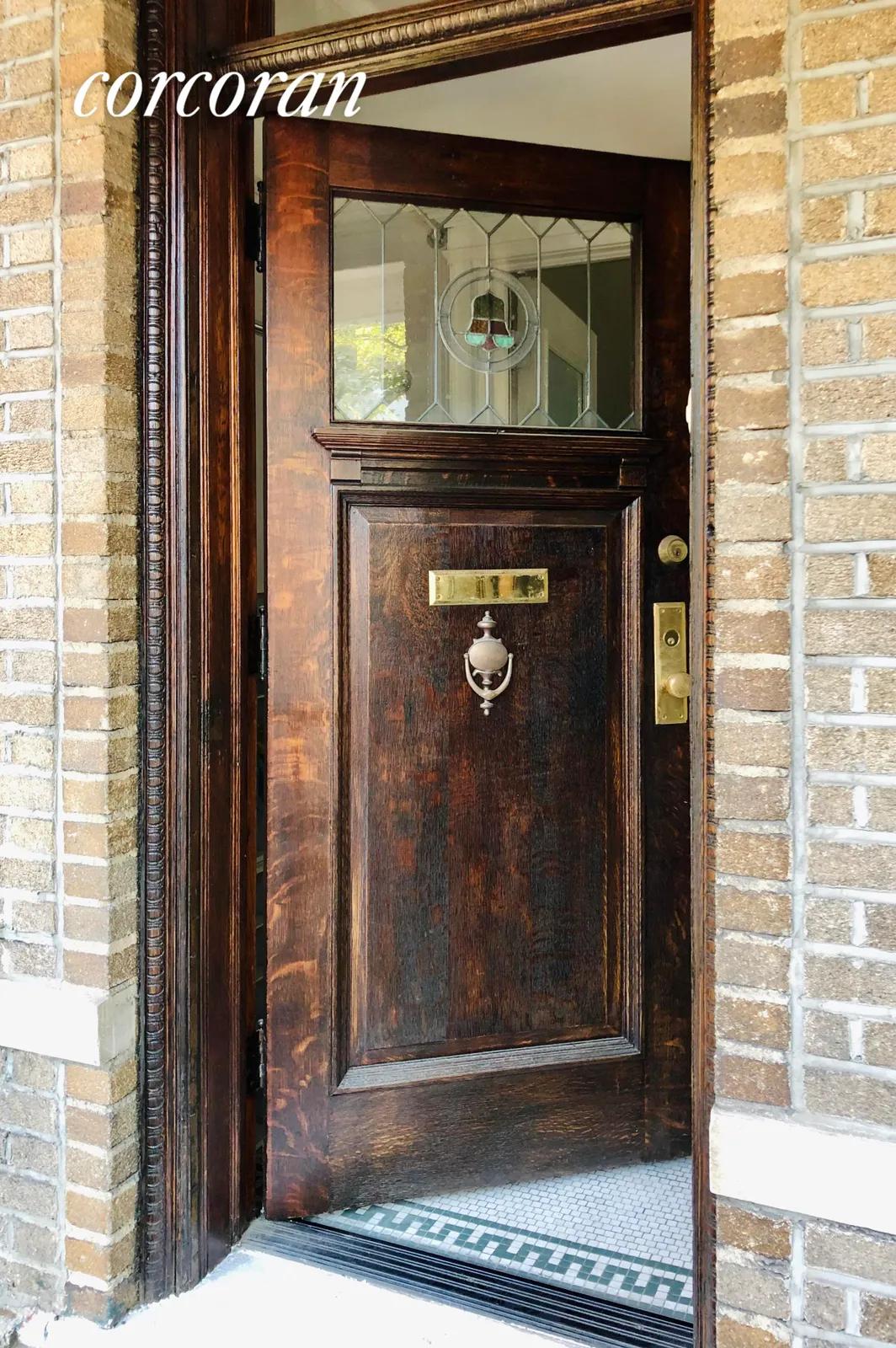 New York City Real Estate | View 441 76th Street | Restored original front door and mosaic entryway | View 23