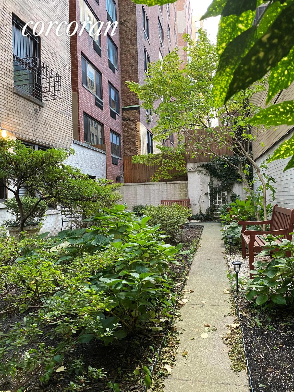 New York City Real Estate | View 179 East 79th Street, 8C | Building Garden | View 11