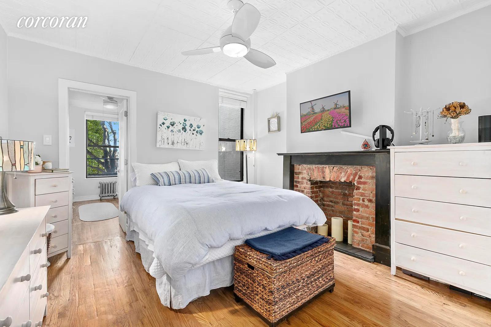 New York City Real Estate | View 1209 8th Avenue, 3R | Primary bedroom with multiple windows and storage | View 5