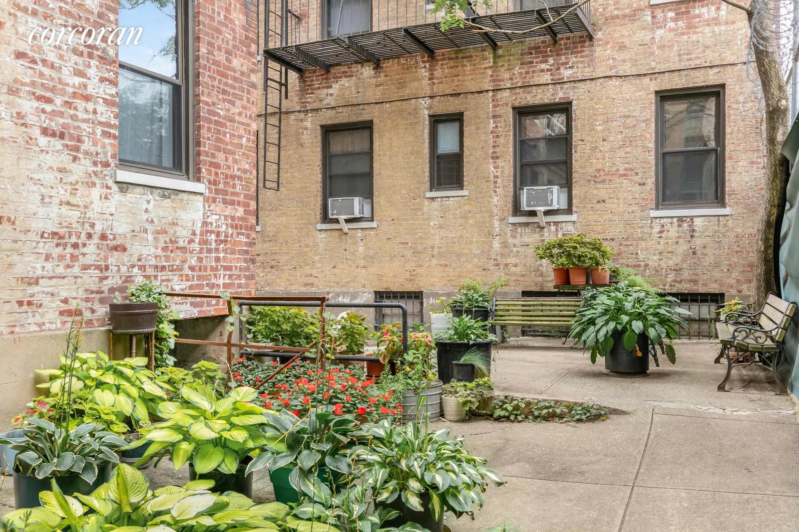 New York City Real Estate | View 135 Hawthorne Street, 1E | Lush Common Garden | View 7