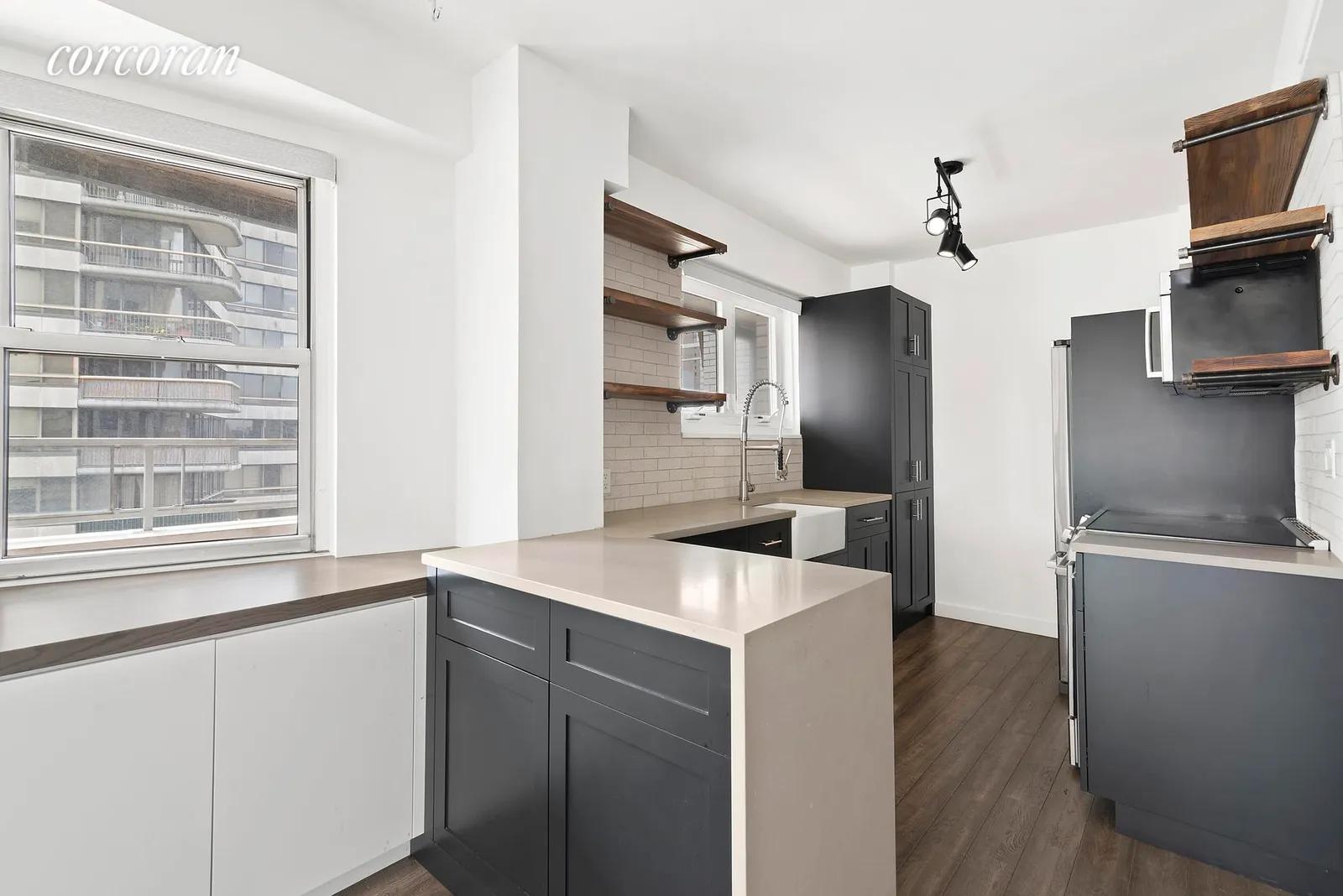 New York City Real Estate | View 175 East 62nd Street, 18B | Open and Windowed Kitchen | View 5