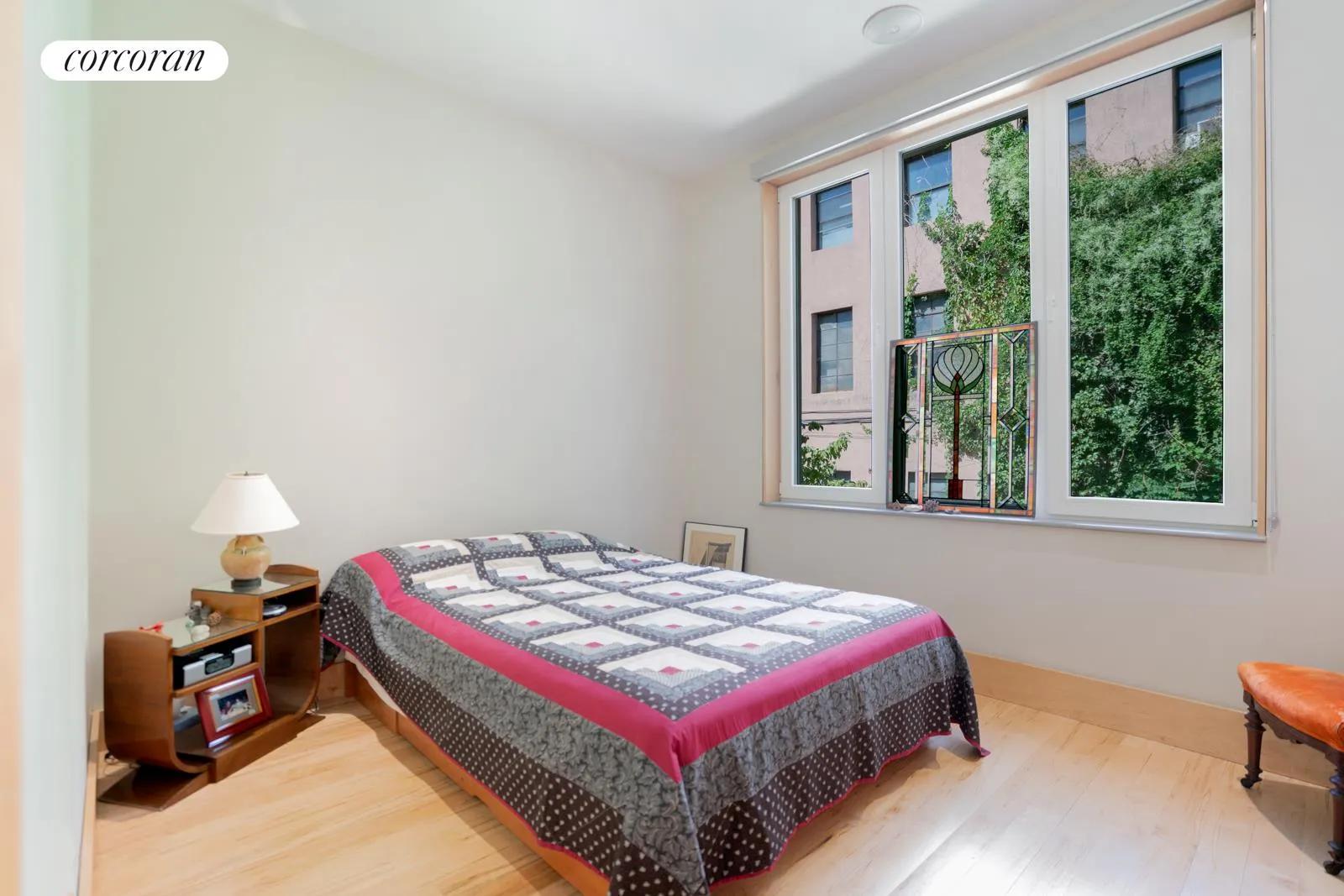 New York City Real Estate | View 45-12 11th Street | Primary Bedroom | View 7