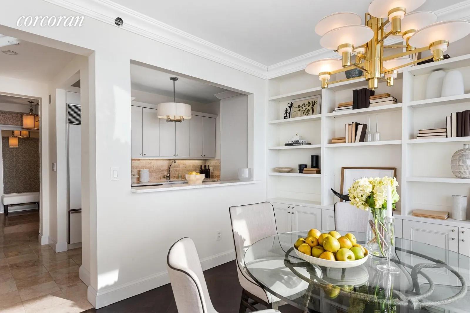New York City Real Estate | View 10 West Street, 24G | Open Kitchen and Dining Area | View 7