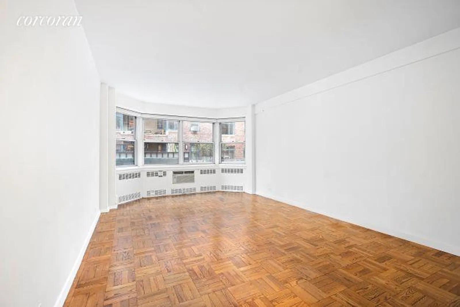 New York City Real Estate | View 155 East 76th Street, 2C | Living / Dining Area | View 4