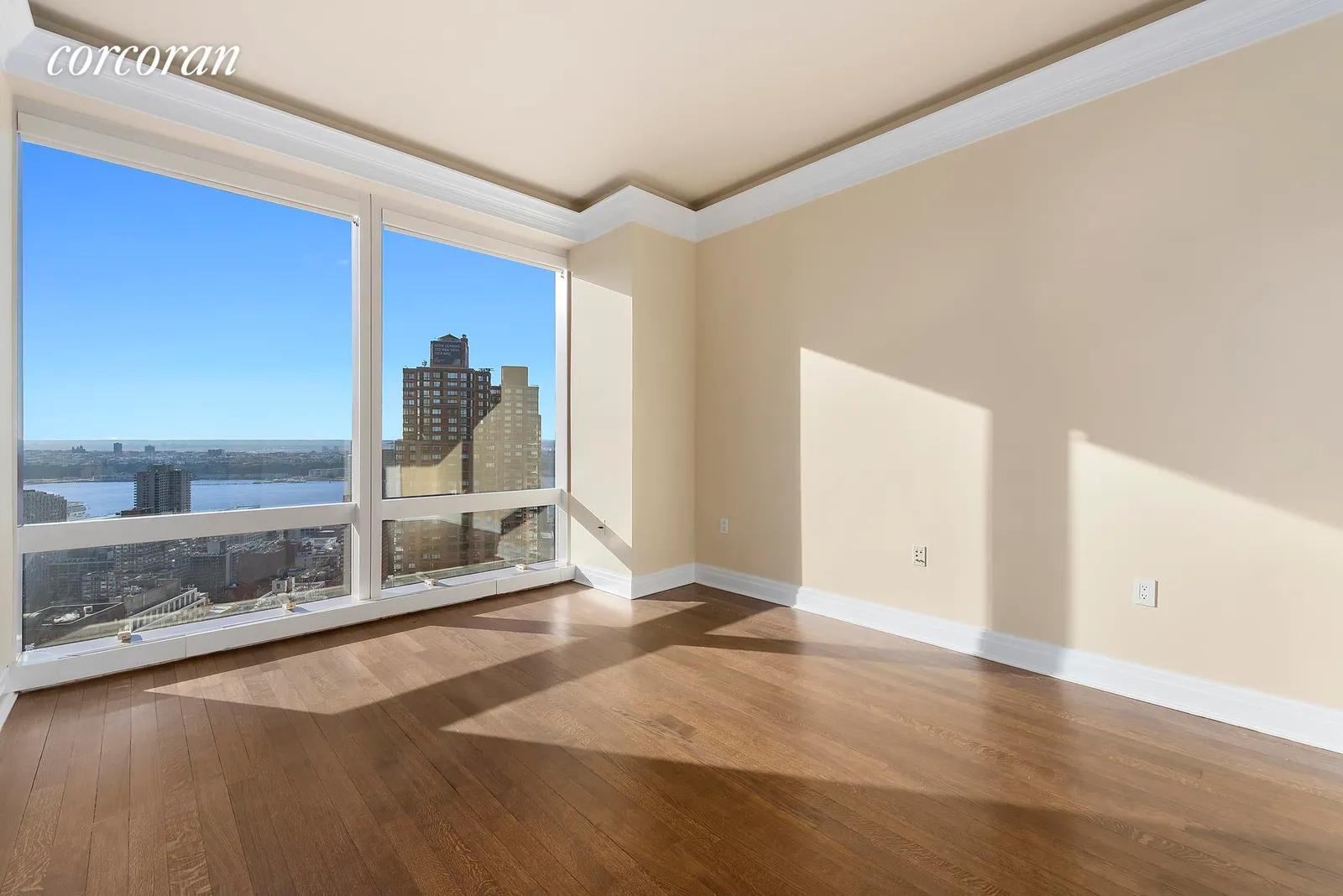 New York City Real Estate | View 25 Columbus Circle, 55F | Second King Sized Bedroom | View 11