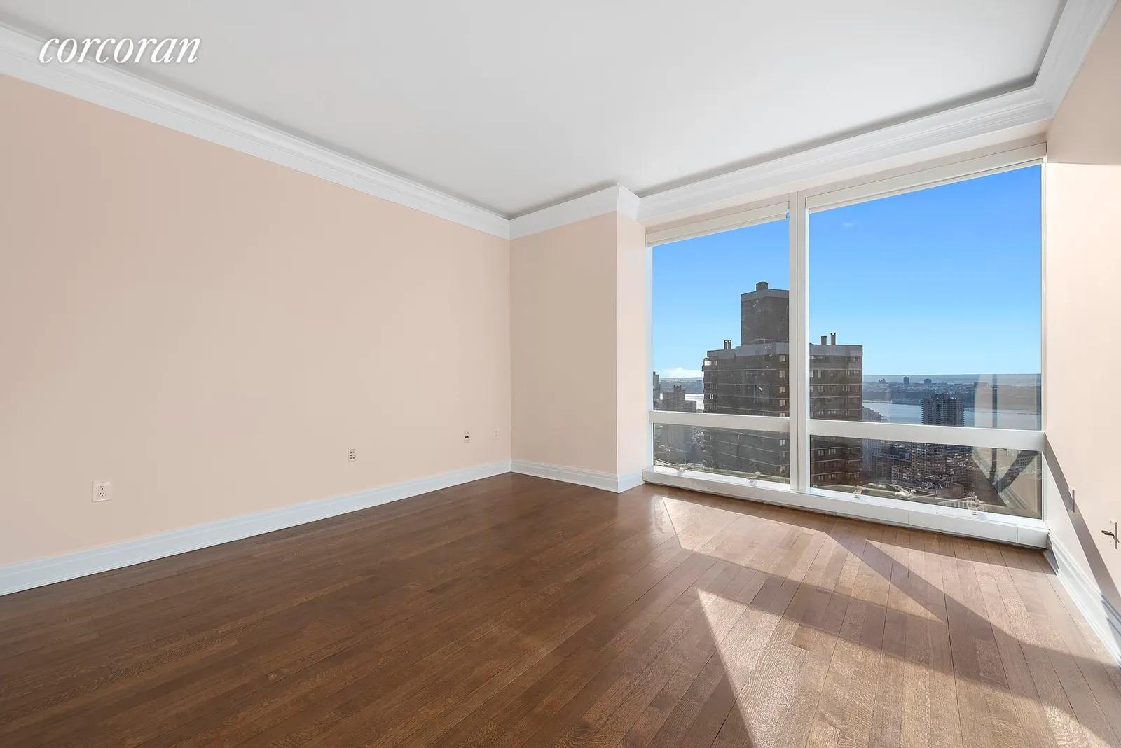 New York City Real Estate | View 25 Columbus Circle, 55F | Primary King Sized Bedroom | View 10