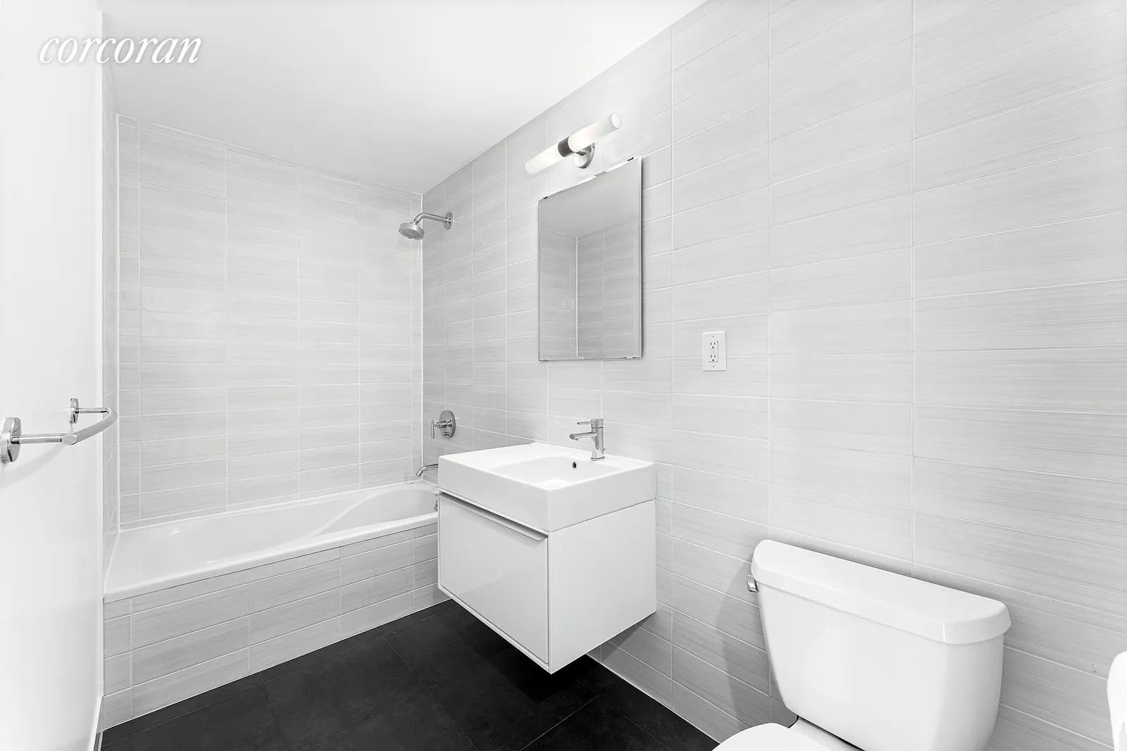New York City Real Estate | View 51 East 128th Street, 1C | Primary Bathroom | View 6