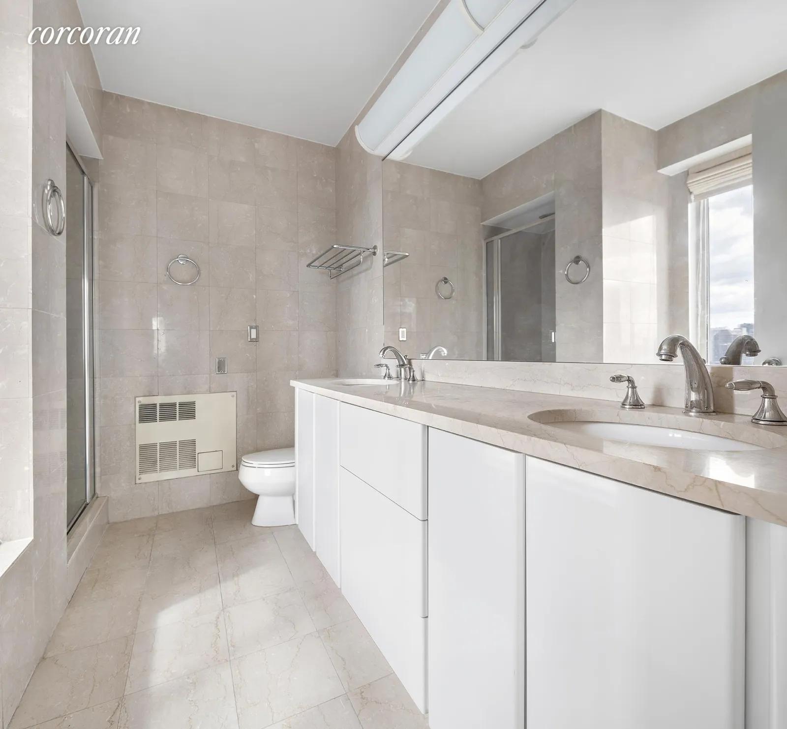 New York City Real Estate | View 200 East 69th Street, 44B | Primary Bathroom | View 12