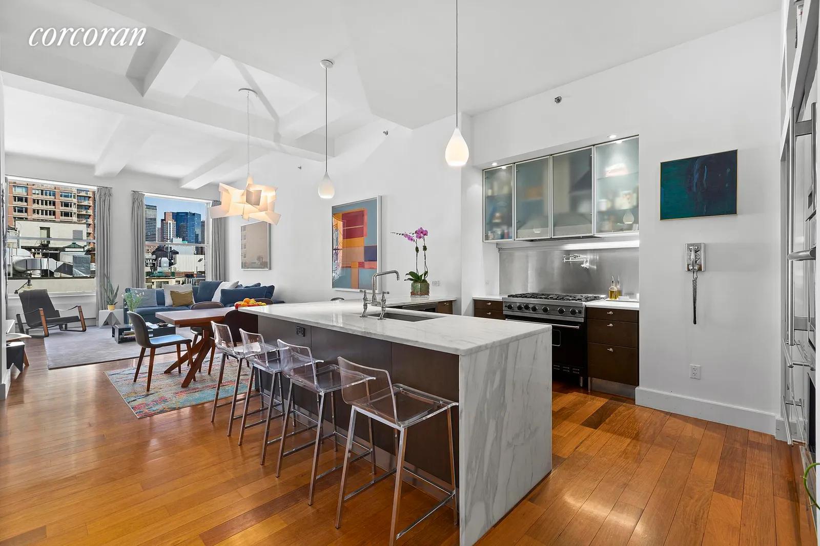 New York City Real Estate | View 15 East 26th Street, 12F | Open Kitchen w Stainless Appliances | View 3
