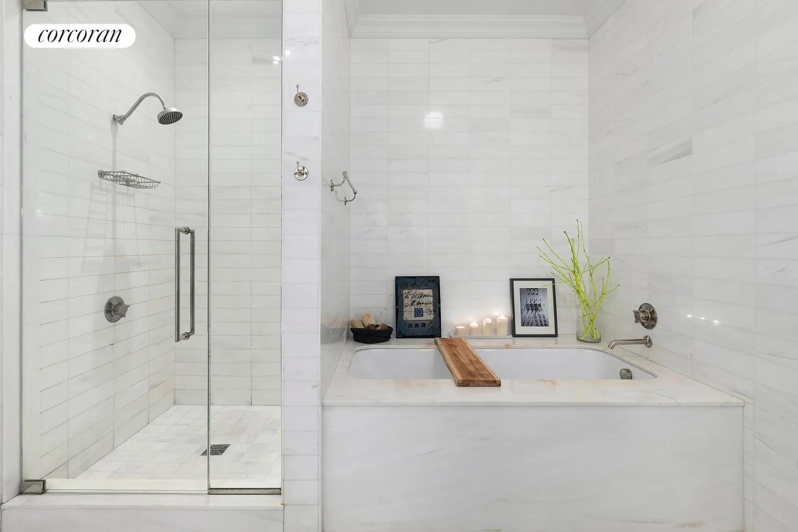 New York City Real Estate | View 15 East 26th Street, 12F | Primary Bath with Tub and Shower | View 6