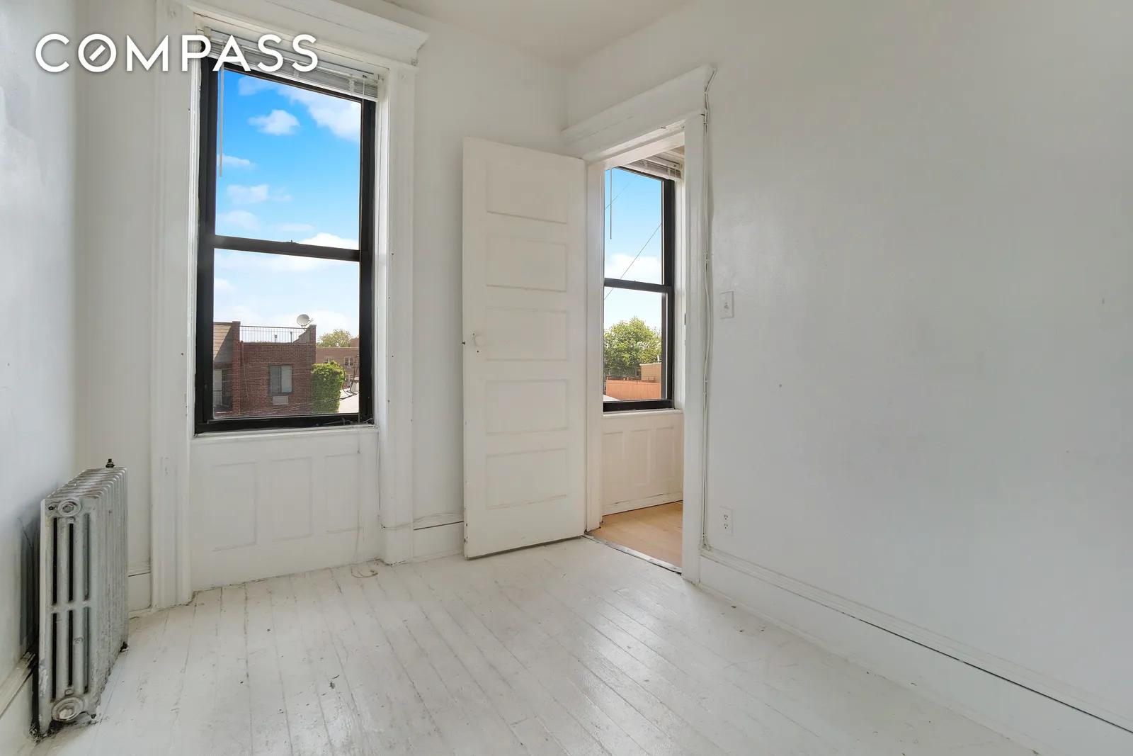 New York City Real Estate | View 63-46 Forest Avenue, Townhouse | Photo (RPX) | View 7