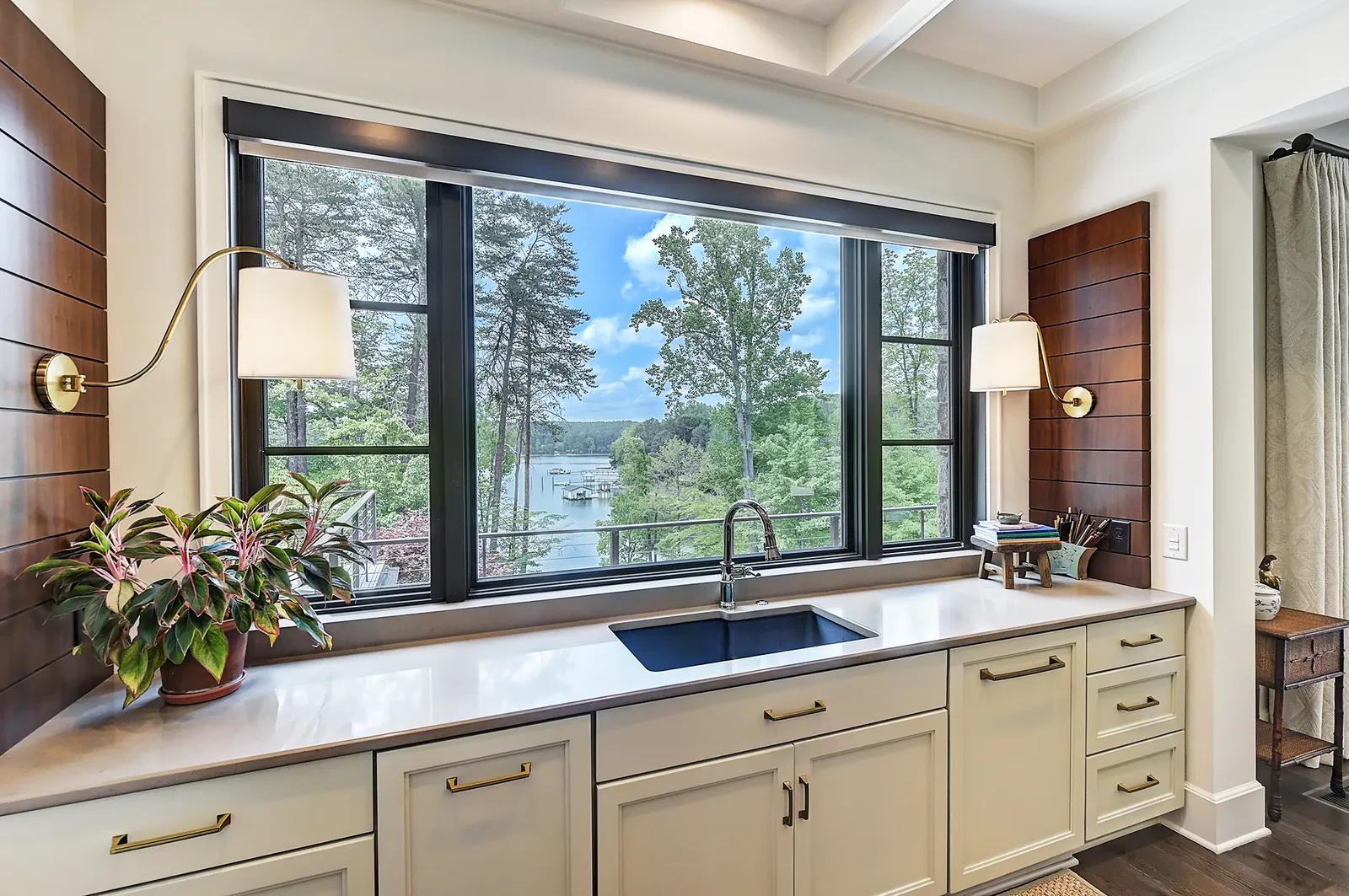 Charlotte Real Estate | View 125 Quiet Waters Drive | Kitchen Sink Overlooking Lake | View 11